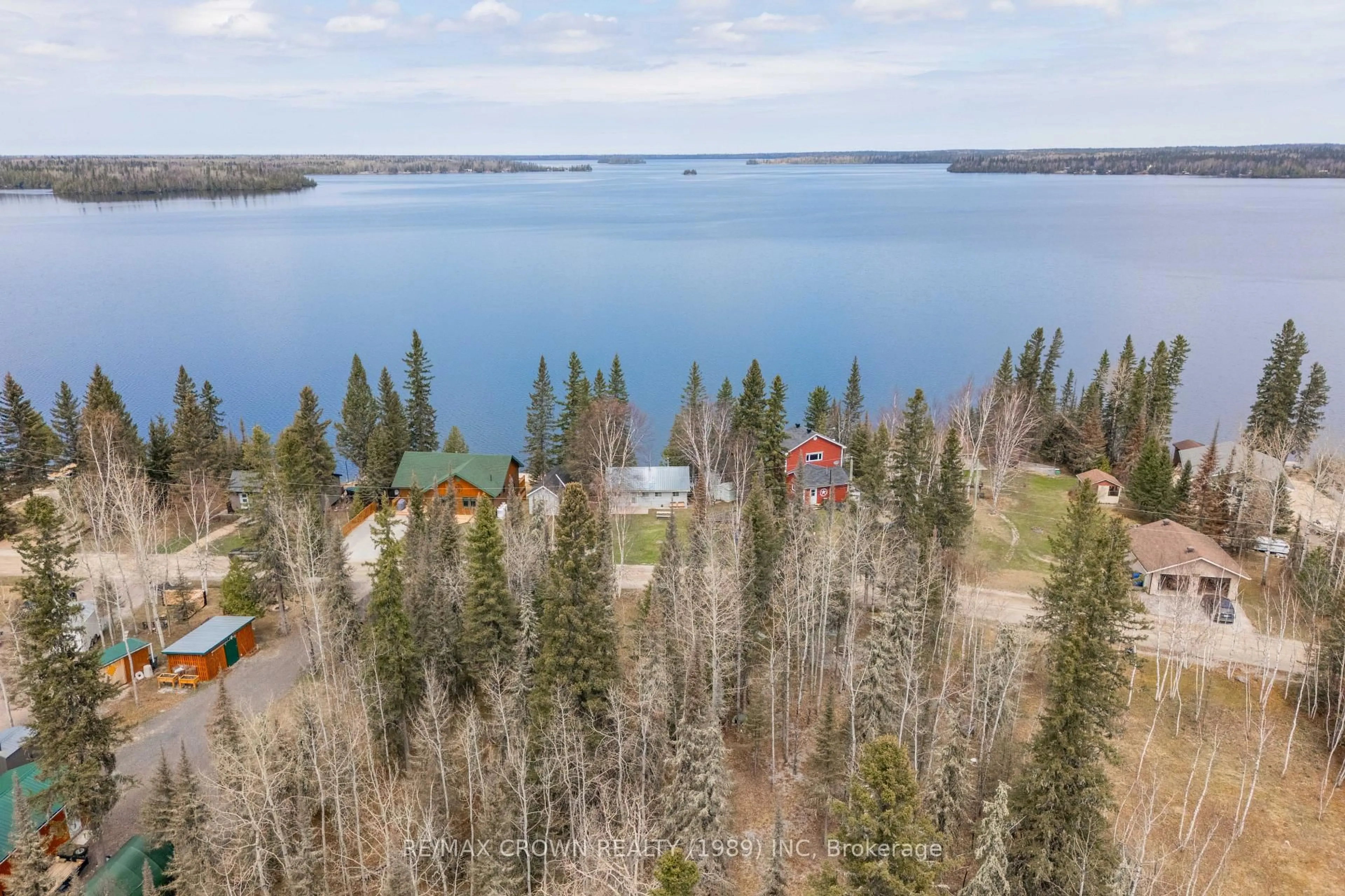 A pic from outside/outdoor area/front of a property/back of a property/a pic from drone, water/lake/river/ocean view for 55 Sailing Club Rd, Moonbeam Ontario P0L 1V0