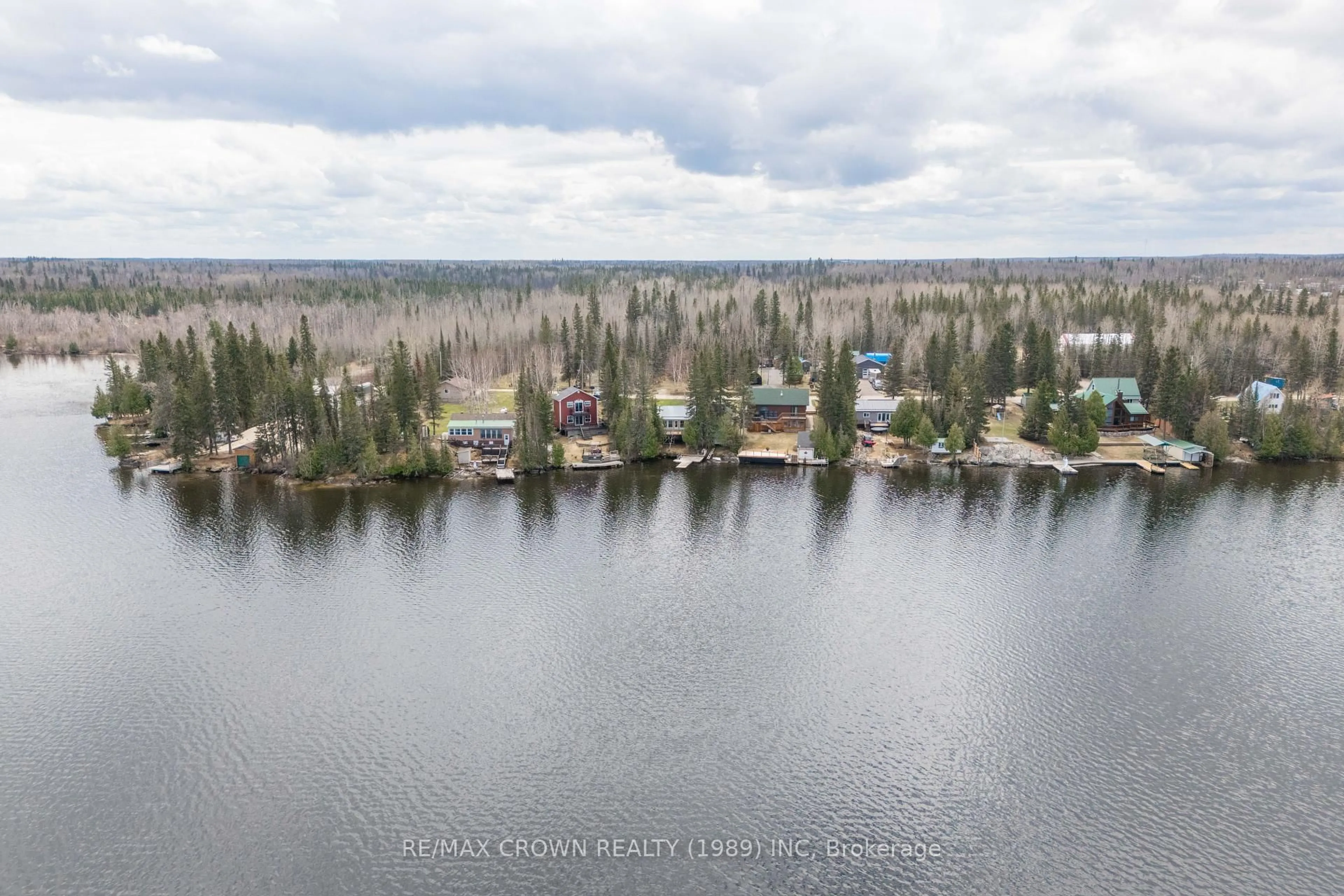 A pic from outside/outdoor area/front of a property/back of a property/a pic from drone, water/lake/river/ocean view for 55 Sailing Club Rd, Moonbeam Ontario P0L 1V0