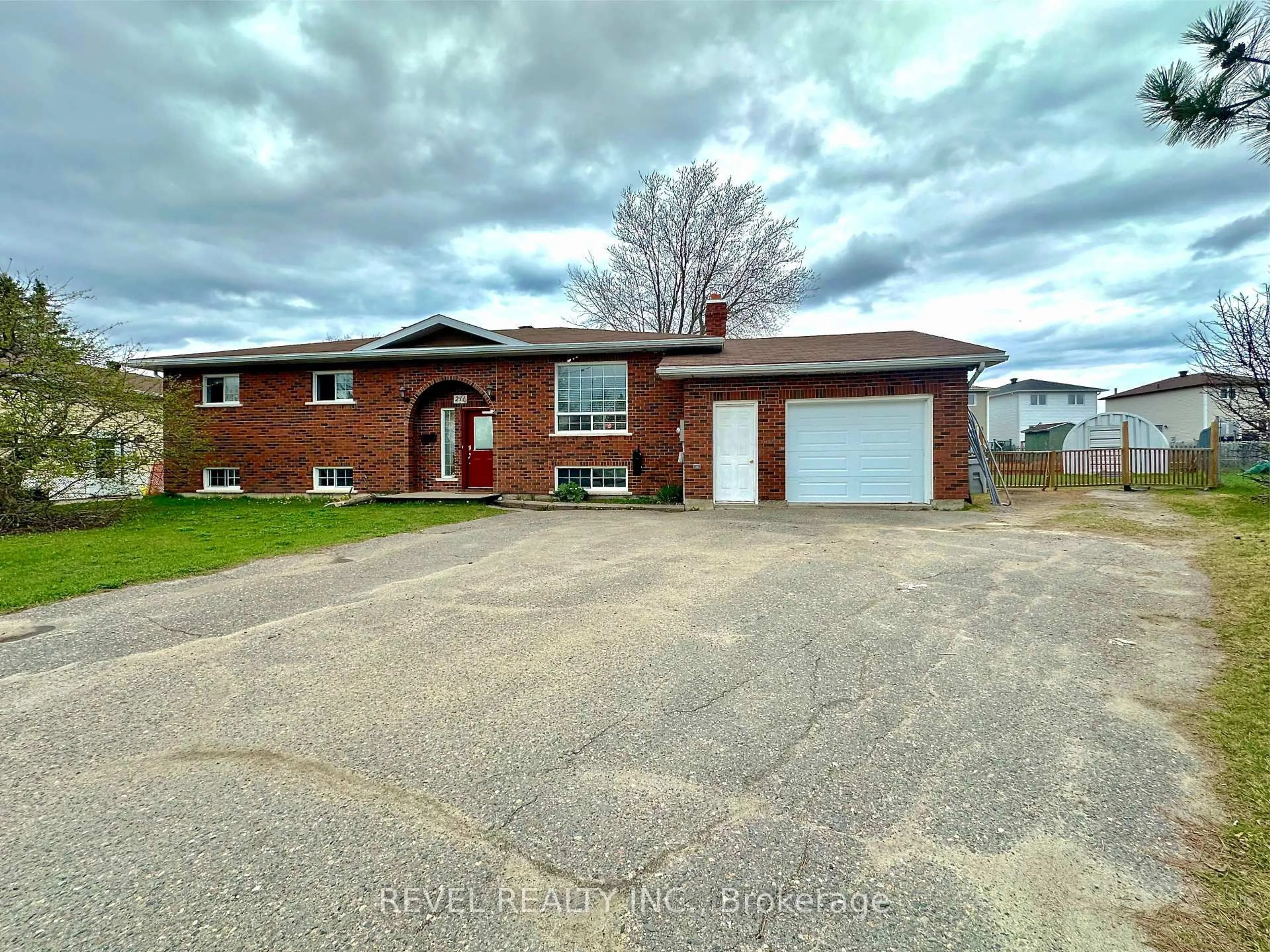 Home with brick exterior material, street for 211 Malette Cres, Timmins Ontario P4P 1C4