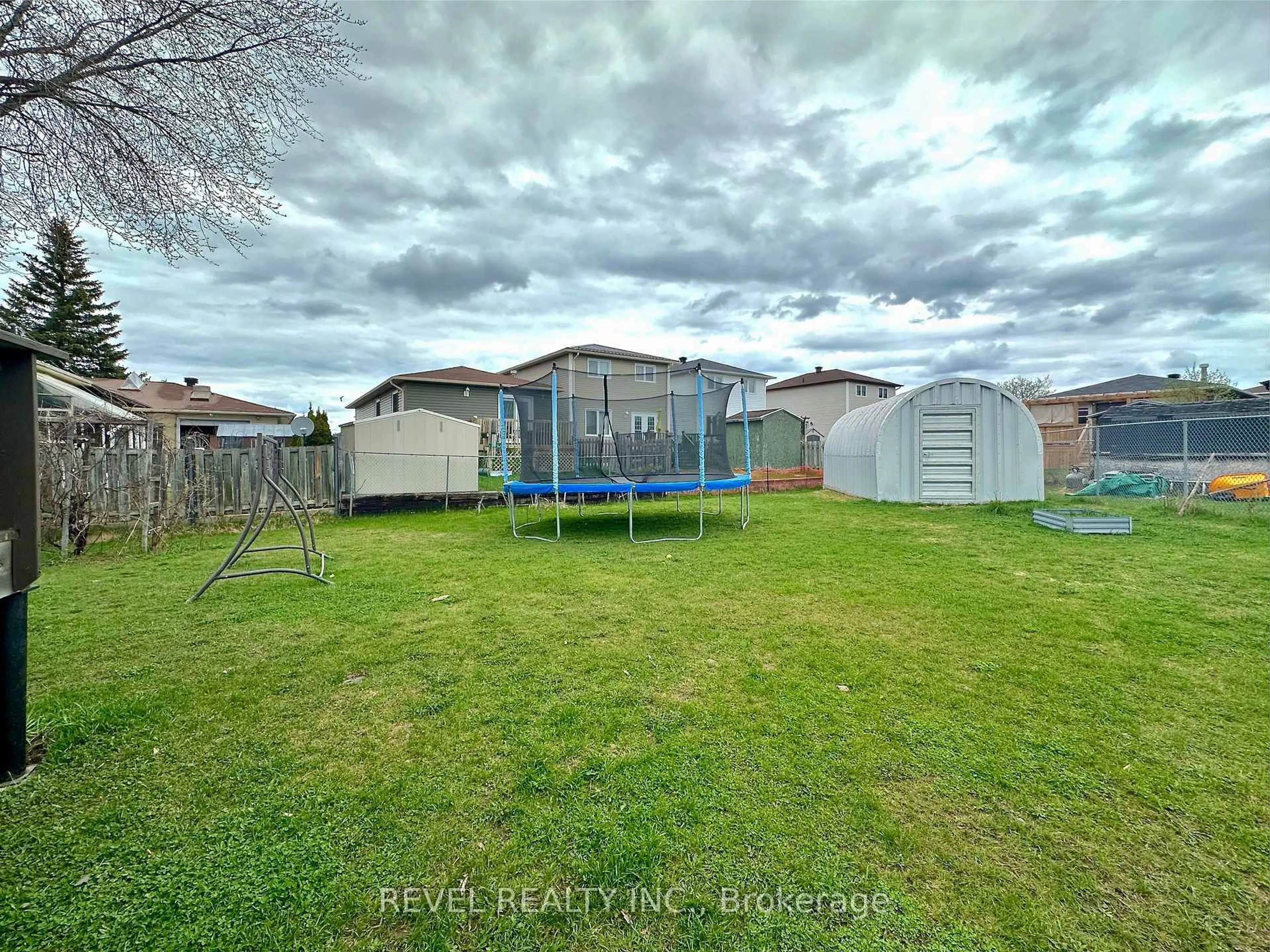 A pic from outside/outdoor area/front of a property/back of a property/a pic from drone, unknown for 211 Malette Cres, Timmins Ontario P4P 1C4