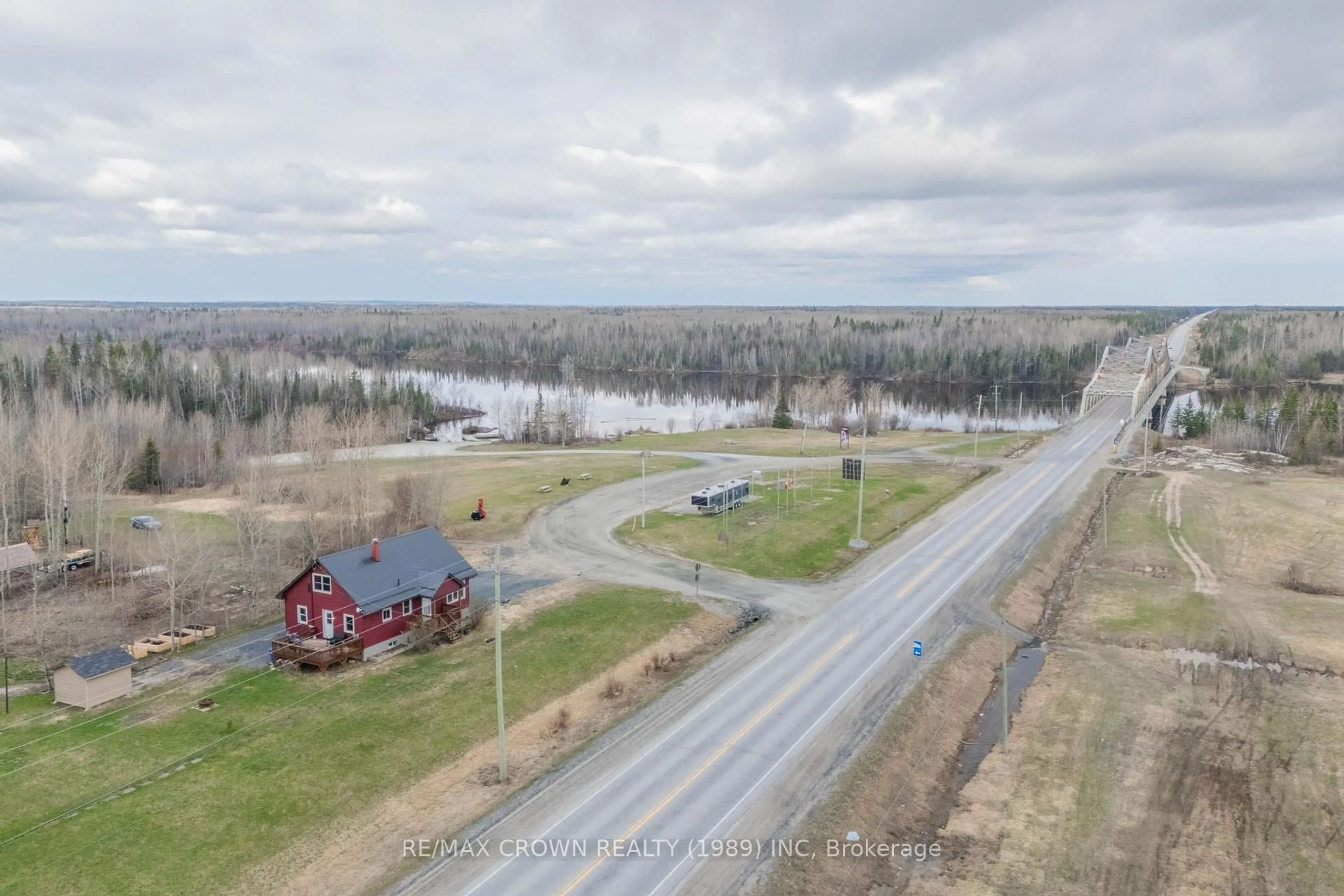 A pic from outside/outdoor area/front of a property/back of a property/a pic from drone, water/lake/river/ocean view for 55 Highway 11 N/A, Smooth Rock Falls Ontario P0L 2B0