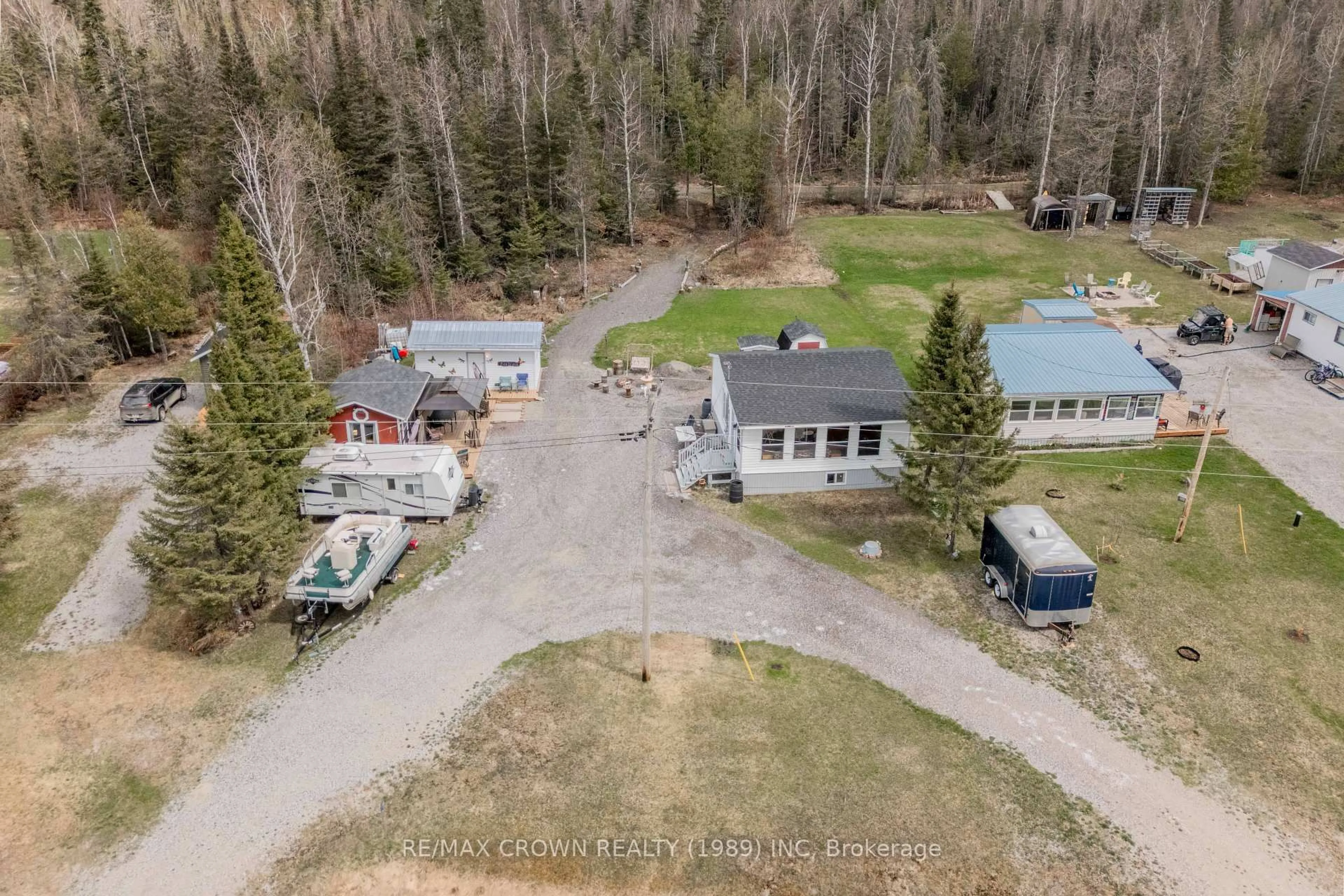 A pic from outside/outdoor area/front of a property/back of a property/a pic from drone, unknown for 56 Remi Lake Rd, Moonbeam Ontario P0L 1V0