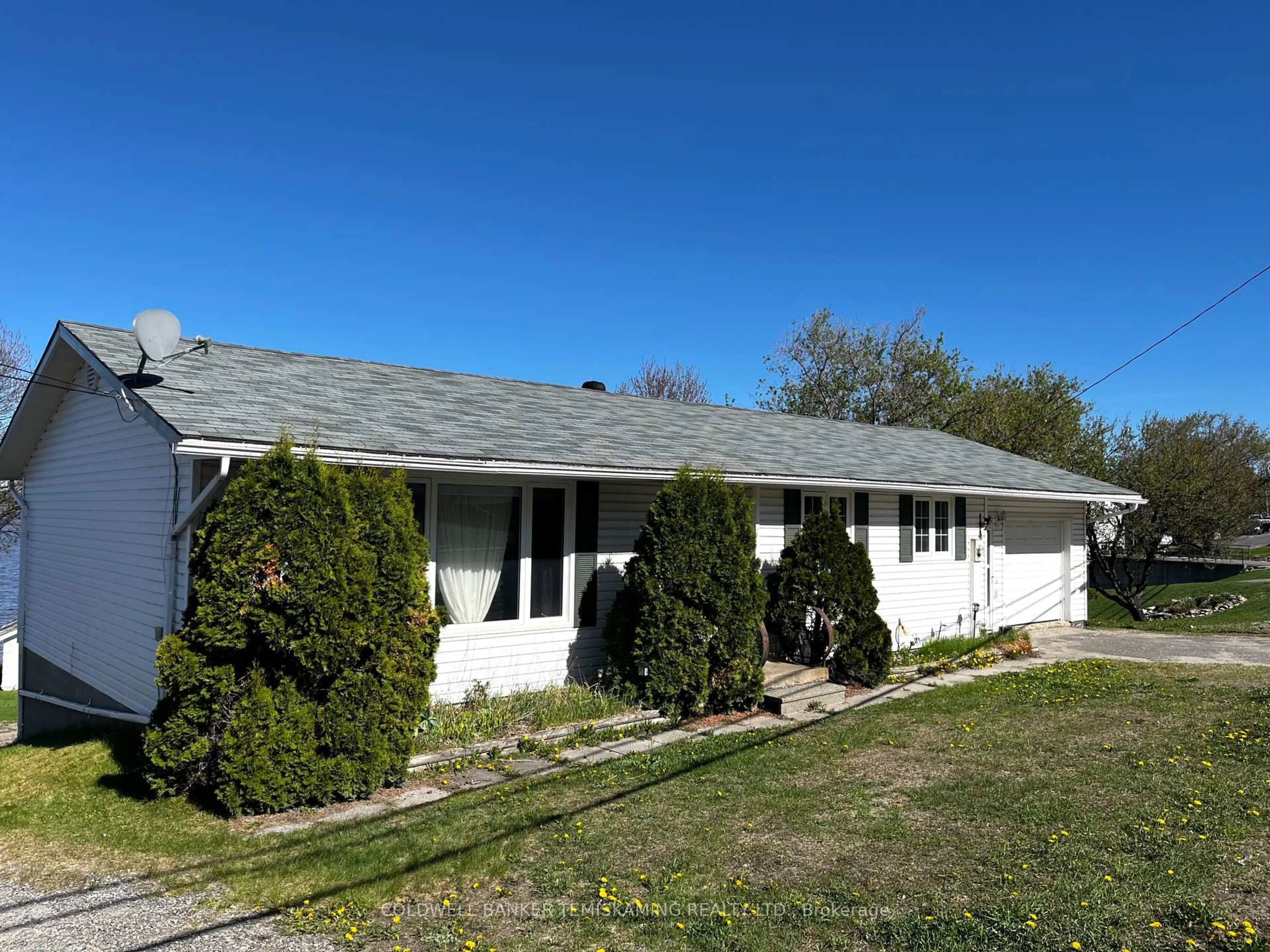 Home with vinyl exterior material, street for 495 Lakeshore Rd, Temiskaming Shores Ontario P0J 1P0