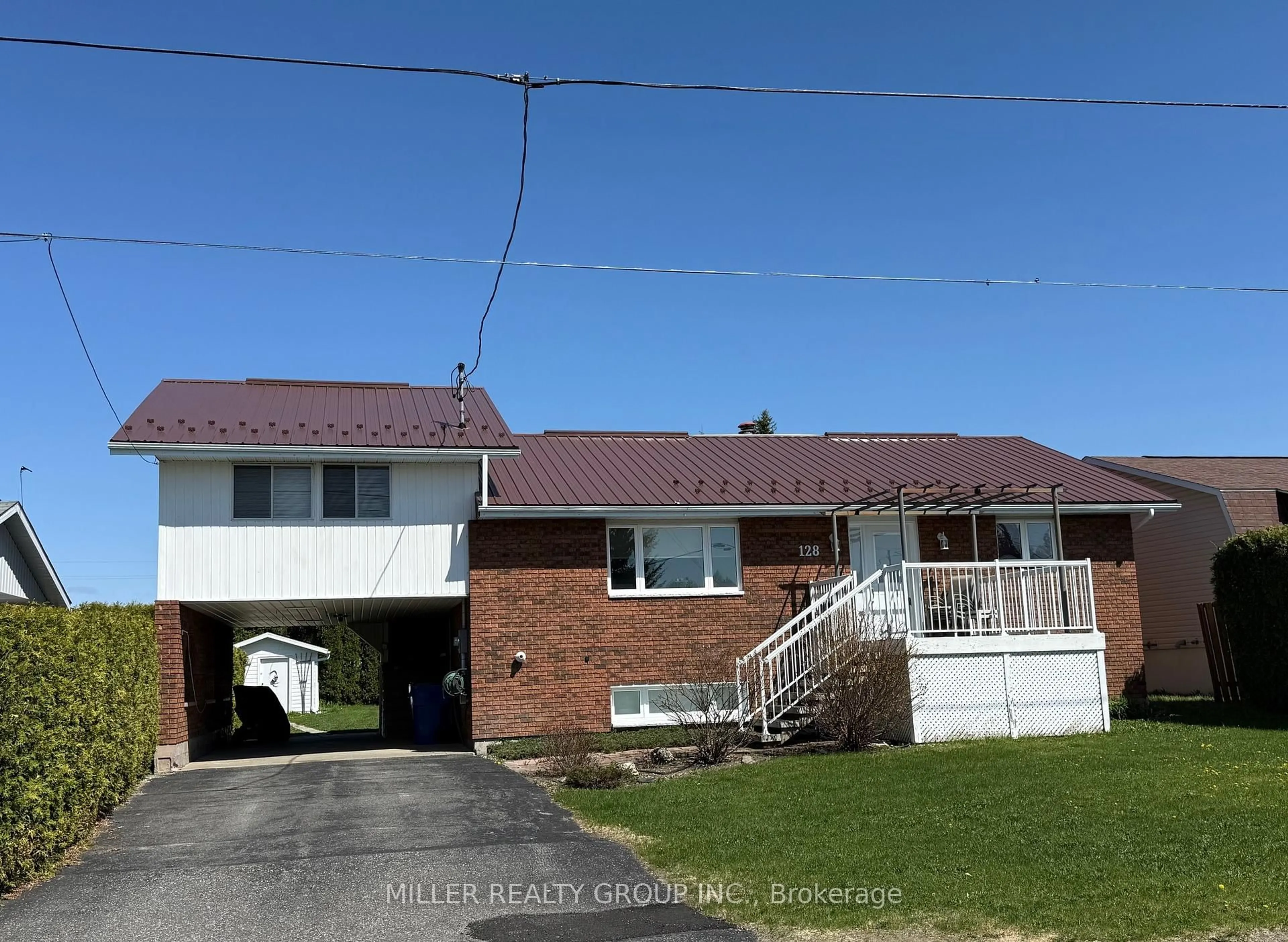 A pic from outside/outdoor area/front of a property/back of a property/a pic from drone, street for 128 Queen St, Temiskaming Shores Ontario P0J 1R0
