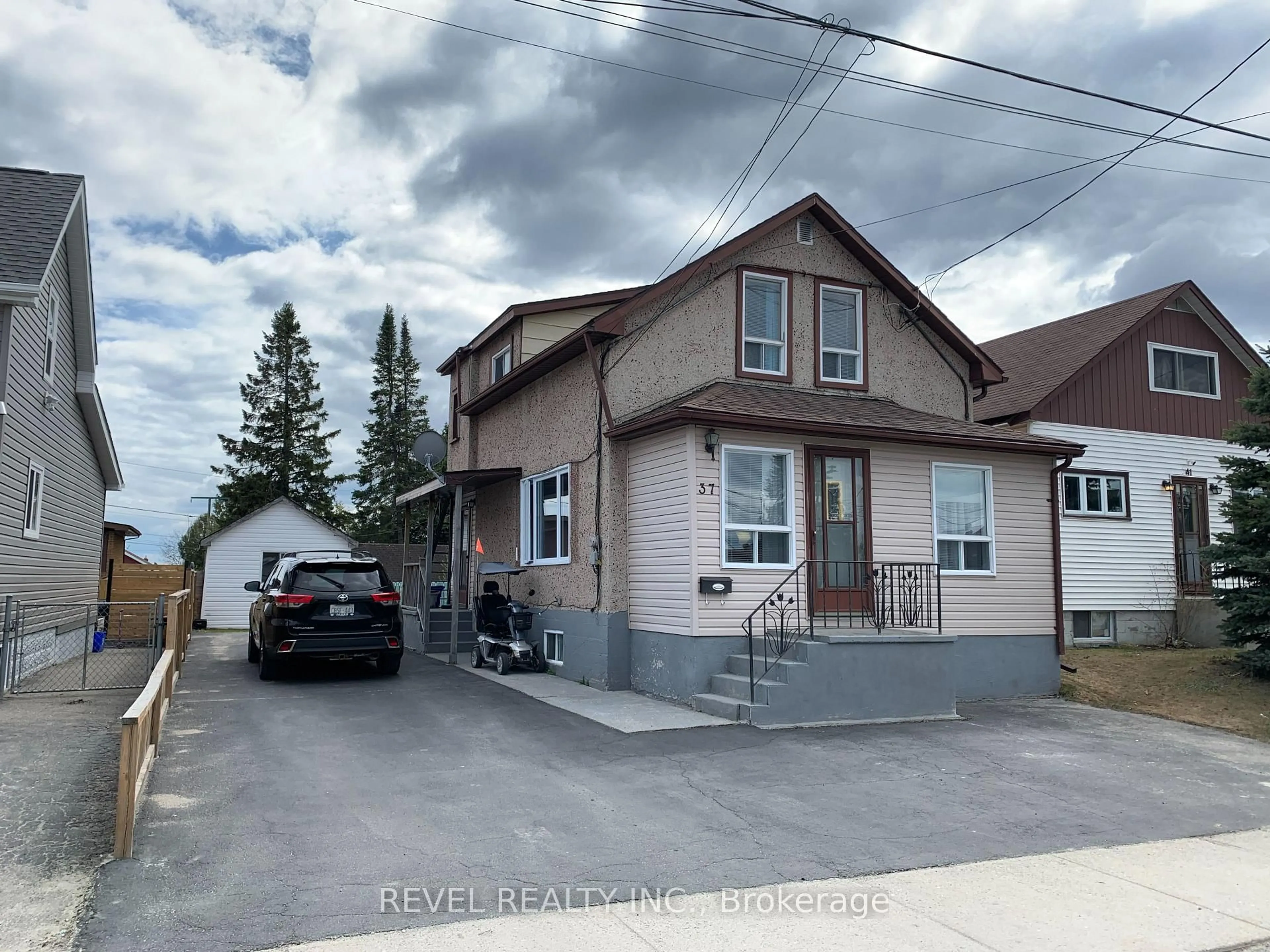 A pic from outside/outdoor area/front of a property/back of a property/a pic from drone, street for 37 Wende Ave, Timmins Ontario P4N 3E1