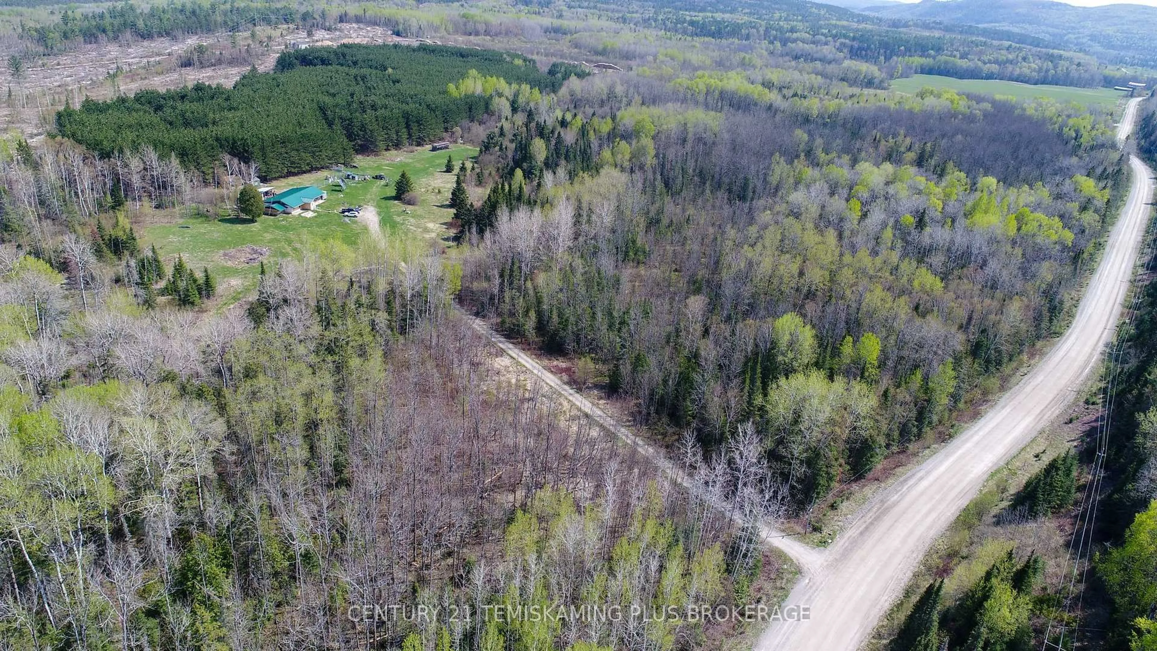 A pic from outside/outdoor area/front of a property/back of a property/a pic from drone, forest/trees view for 973293 567 Highway, Timiskaming Ontario P0J 1R0