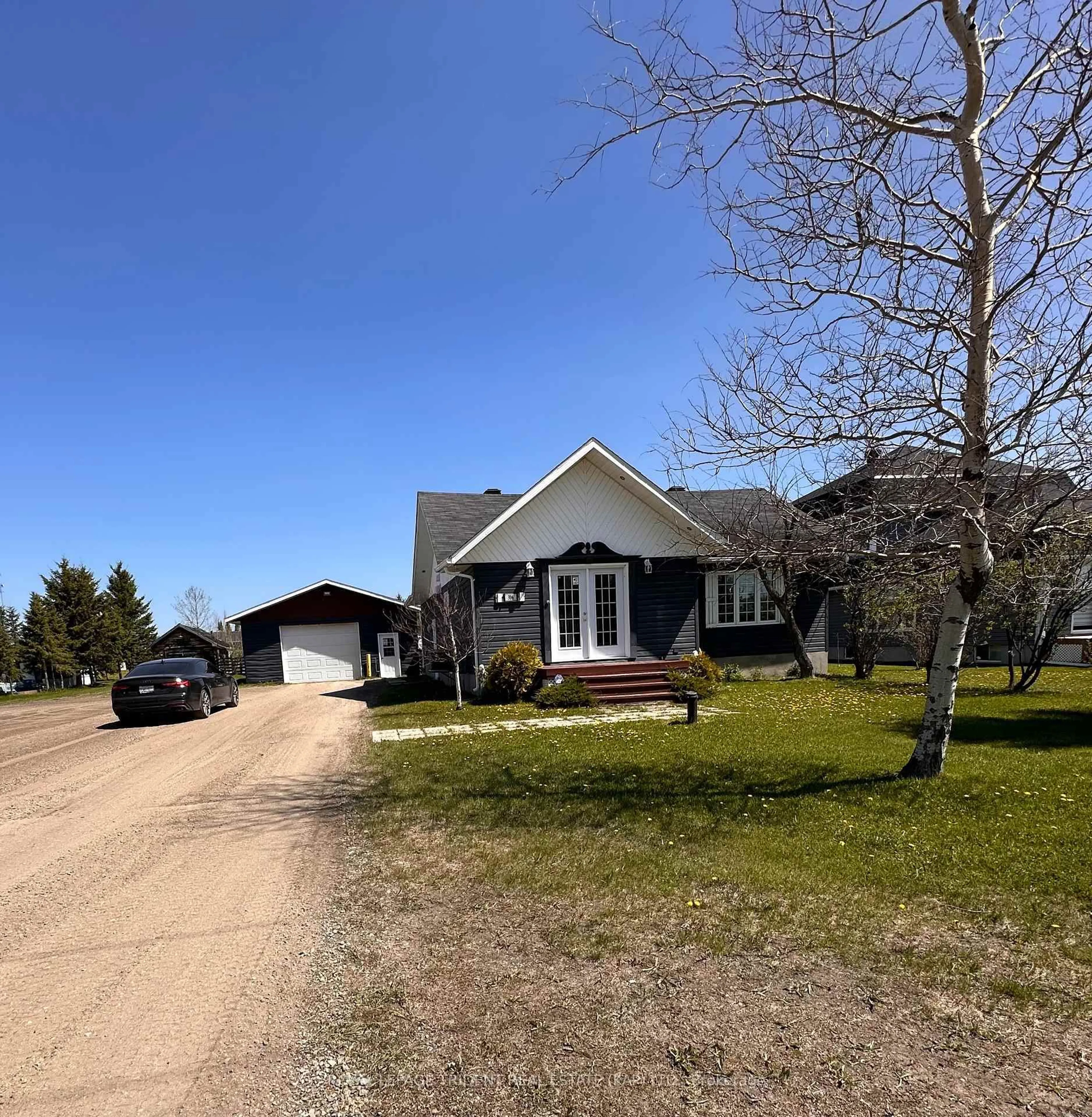 A pic from outside/outdoor area/front of a property/back of a property/a pic from drone, street for 306 Government Rd, Kapuskasing Ontario P0L 1M0