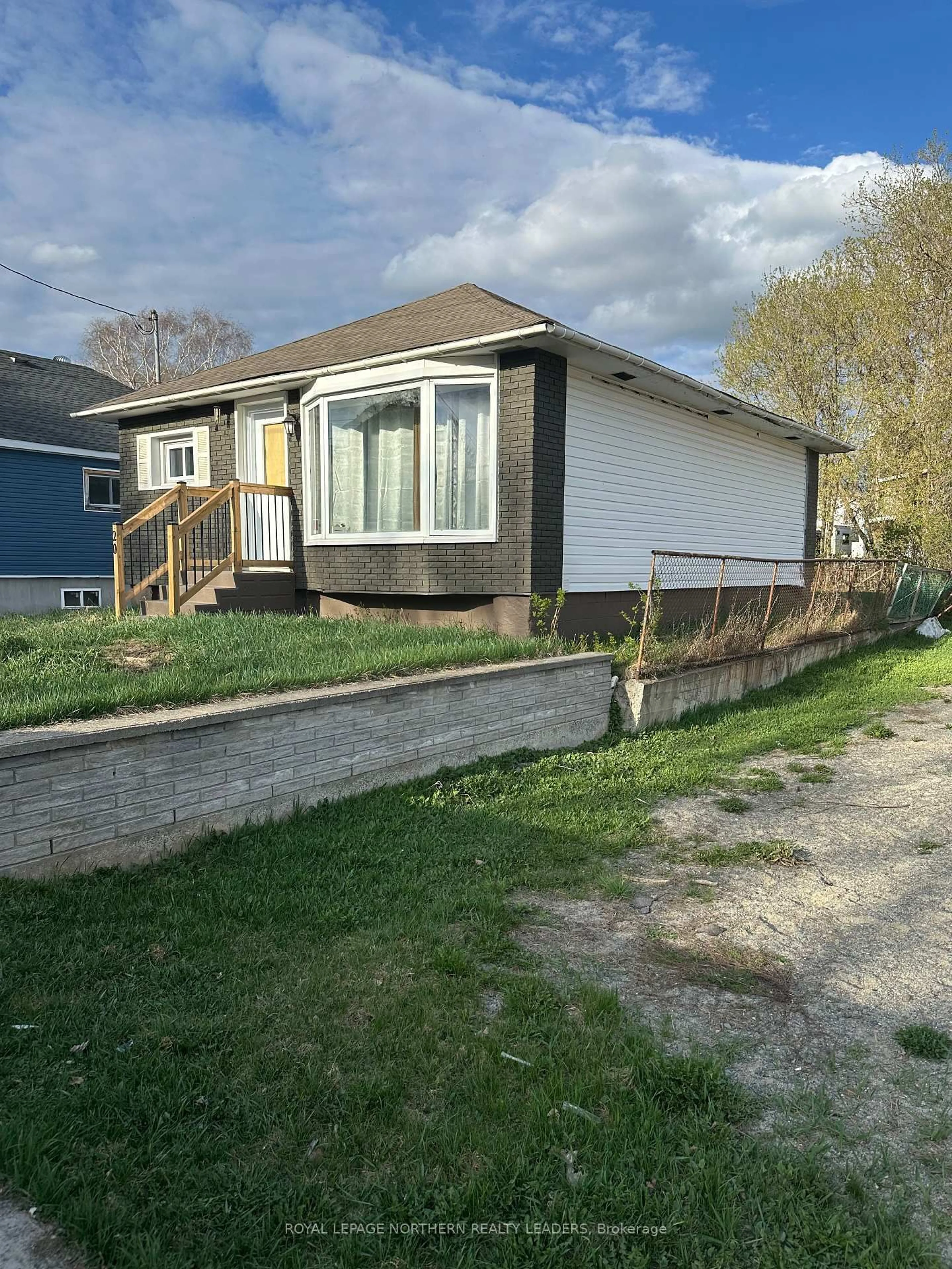 A pic from outside/outdoor area/front of a property/back of a property/a pic from drone, street for 20 O'Meara Blvd, Kirkland Lake Ontario P4N 2T6