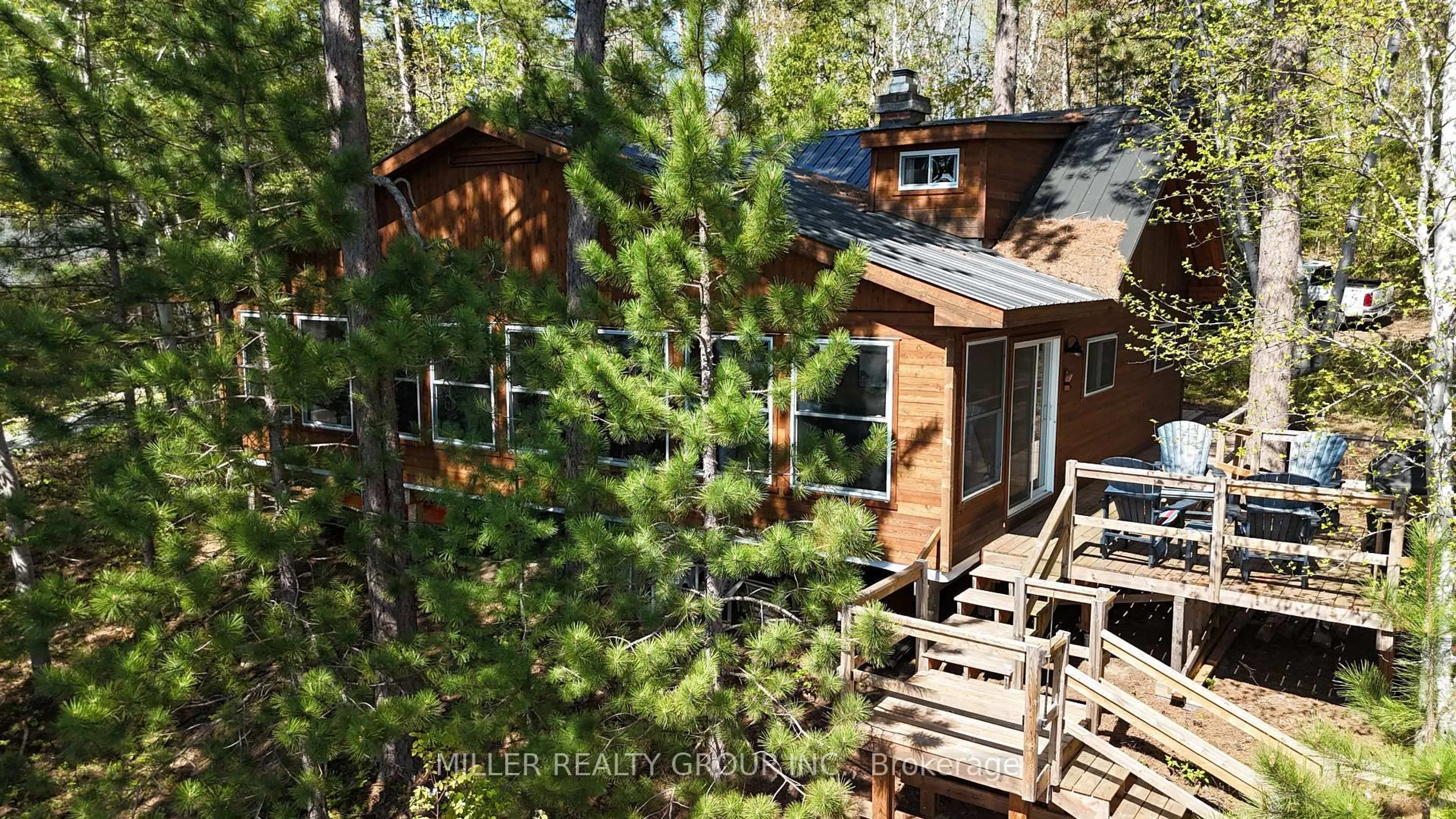 A pic from outside/outdoor area/front of a property/back of a property/a pic from drone, forest/trees view for 3257 Twin Lakes Rd A Rd, Timiskaming Ontario P0J 1P0