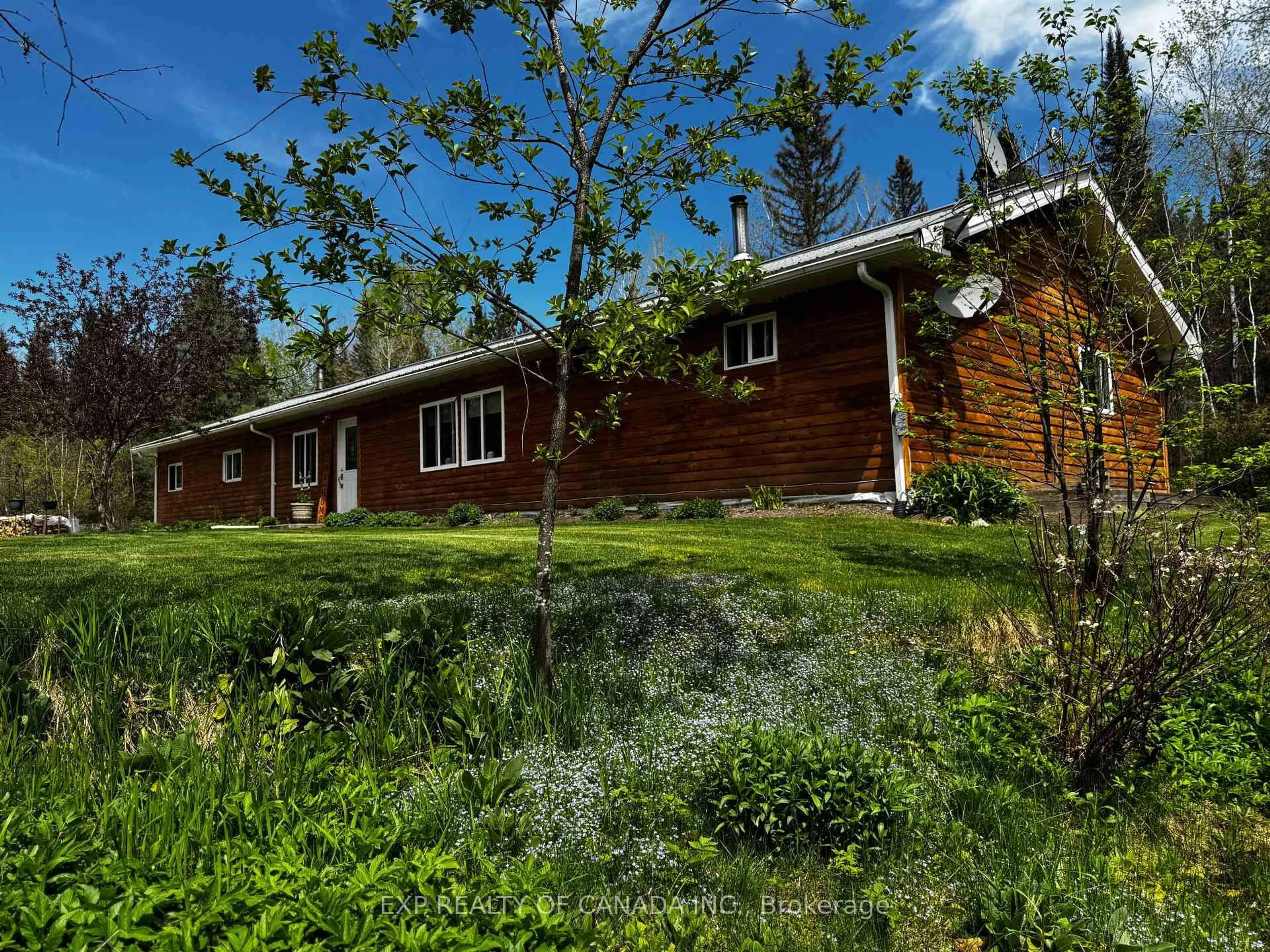 A pic from outside/outdoor area/front of a property/back of a property/a pic from drone, unknown for 2028 Toggenberg Tr, Kirkland Lake Ontario P0K 1T0