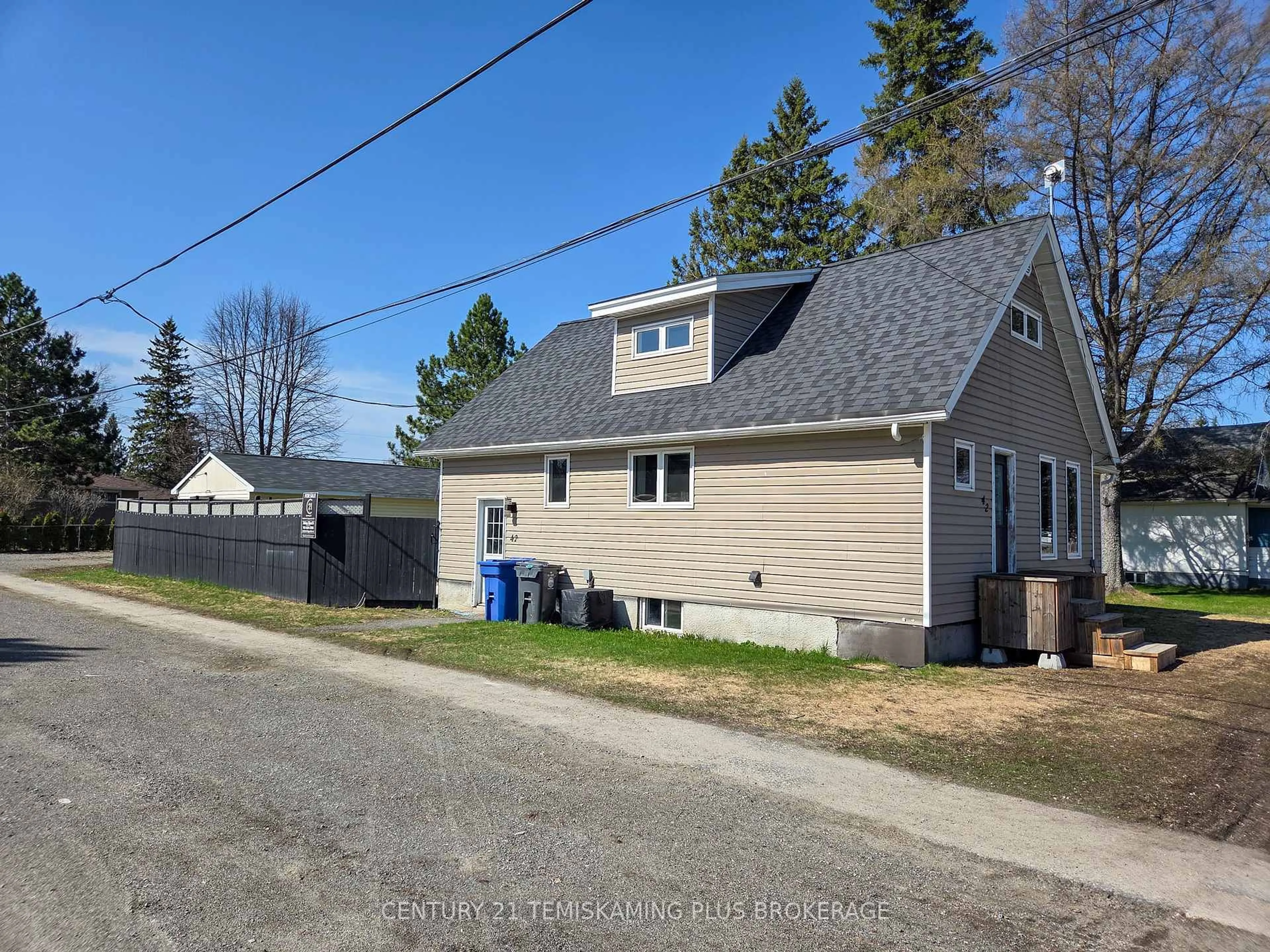 A pic from outside/outdoor area/front of a property/back of a property/a pic from drone, street for 42 5th Ave, Englehart Ontario P0J 1H0