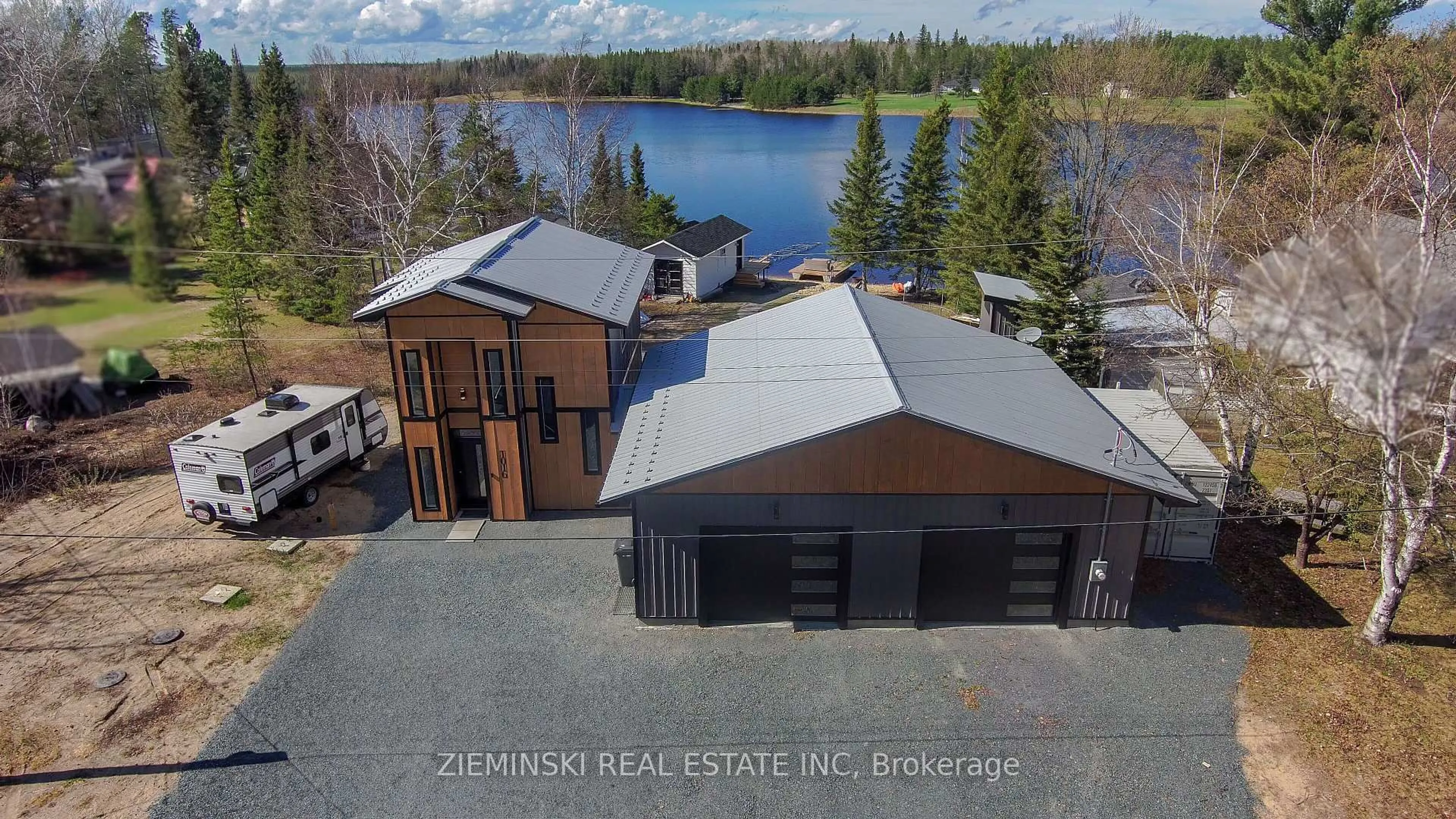 A pic from outside/outdoor area/front of a property/back of a property/a pic from drone, water/lake/river/ocean view for 1016 Highway Beach Rd, Iroquois Falls Ontario P0K 1G0