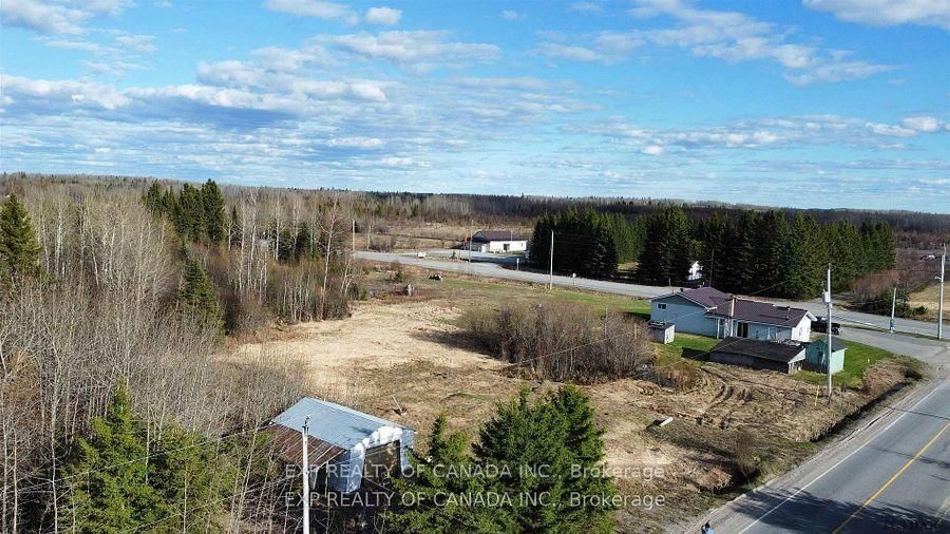 A pic from outside/outdoor area/front of a property/back of a property/a pic from drone, water/lake/river/ocean view for 4198 101 Highway, Black River Matheson Ontario P0K 1N0