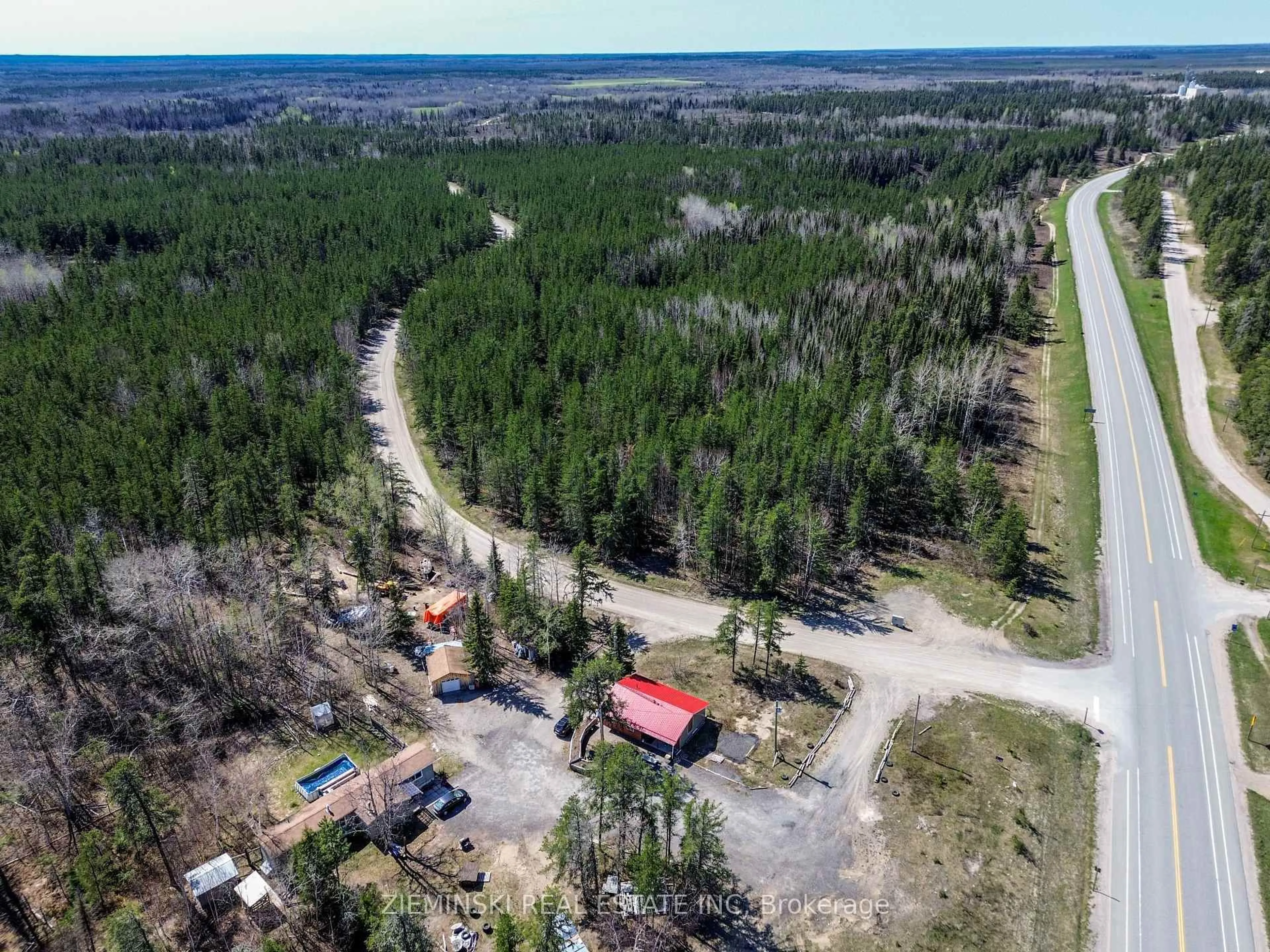 A pic from outside/outdoor area/front of a property/back of a property/a pic from drone, forest/trees view for 1001 Wilson Lake Rd, Iroquois Falls Ontario P0K 1G0