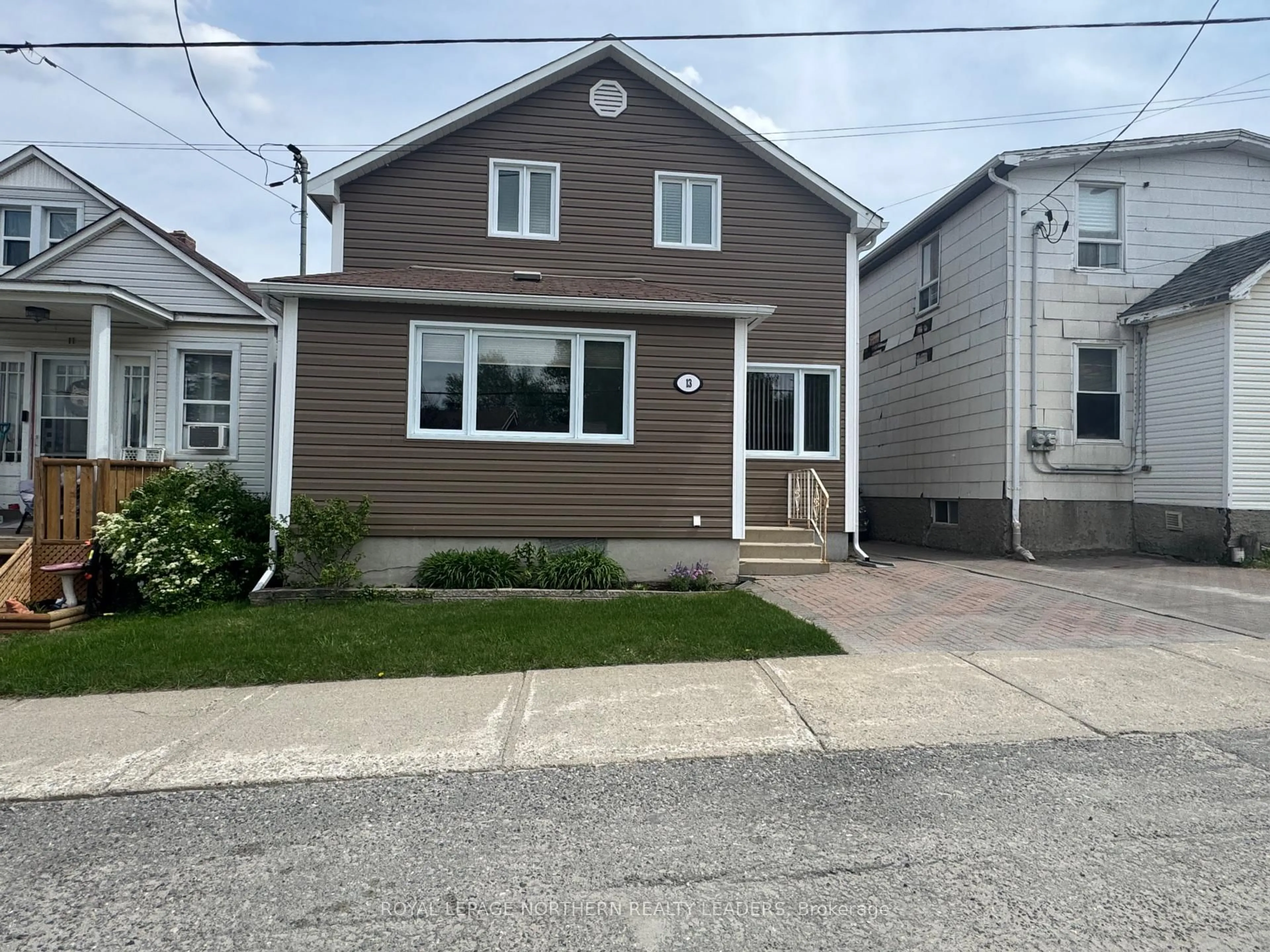 Home with vinyl exterior material, street for 13 Vipond Rd, Timmins Ontario P0N 1G0