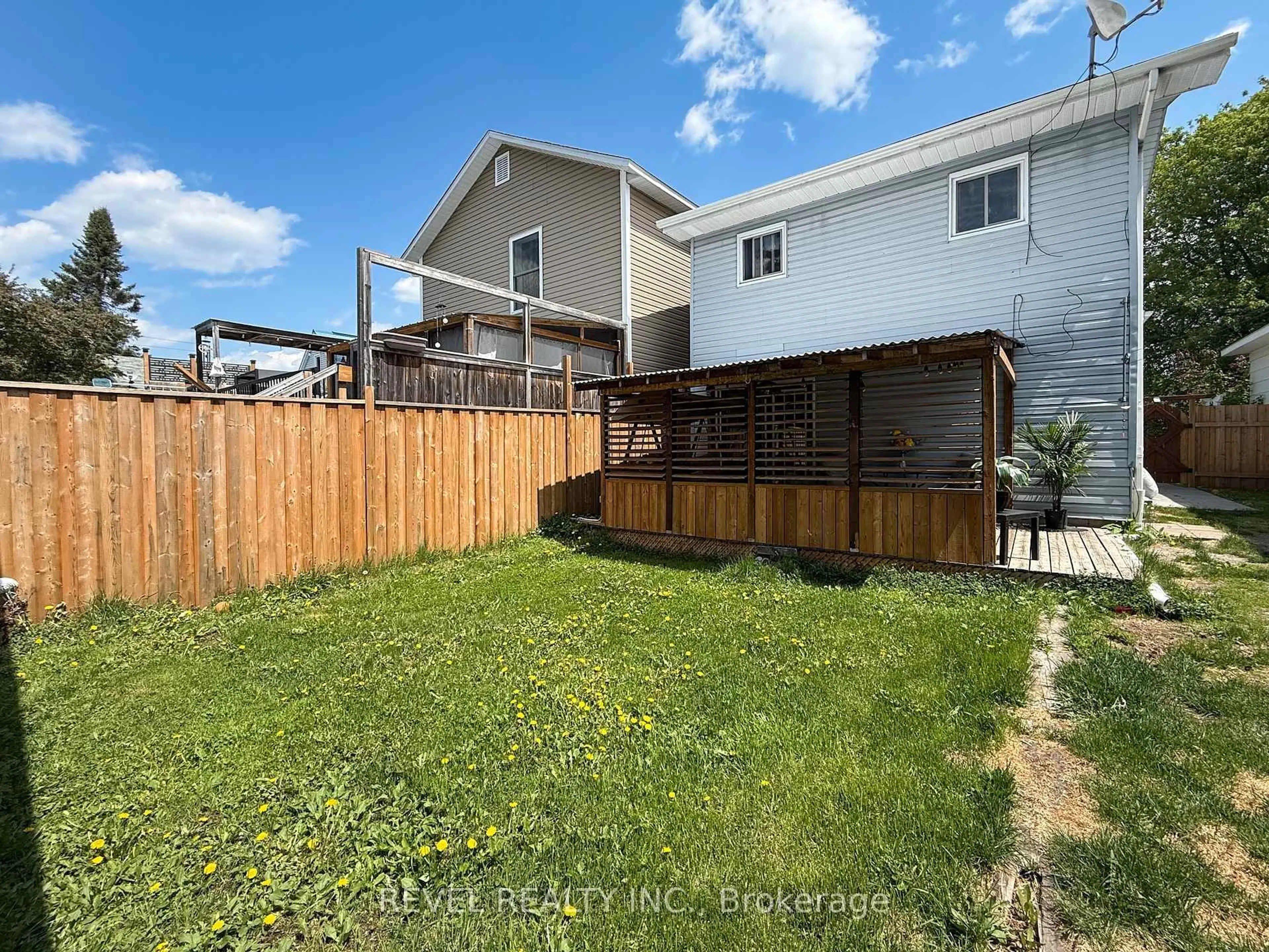 A pic from outside/outdoor area/front of a property/back of a property/a pic from drone, street for 573 Birch St, Timmins Ontario P4N 2C3