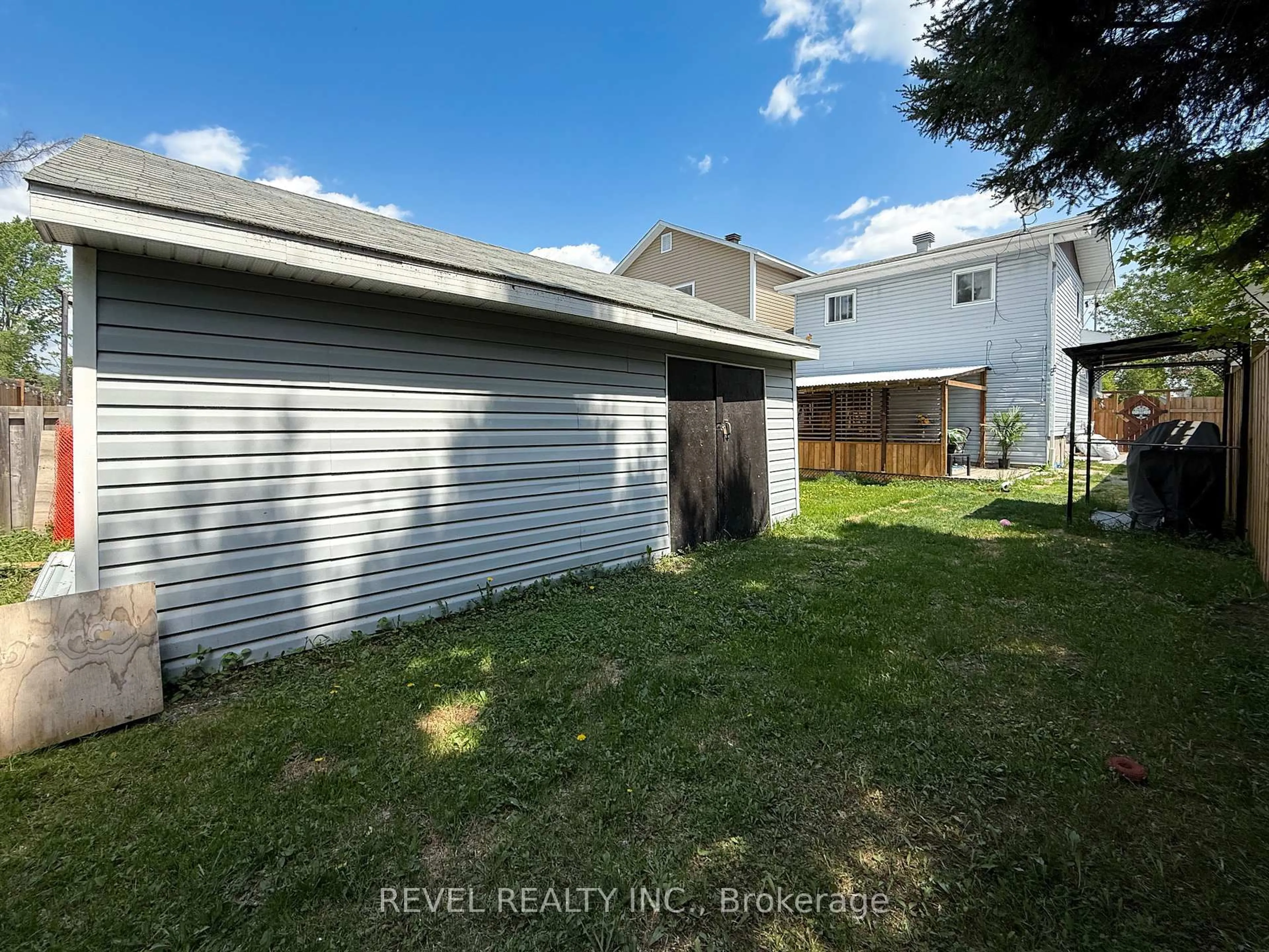 A pic from outside/outdoor area/front of a property/back of a property/a pic from drone, unknown for 573 Birch St, Timmins Ontario P4N 2C3