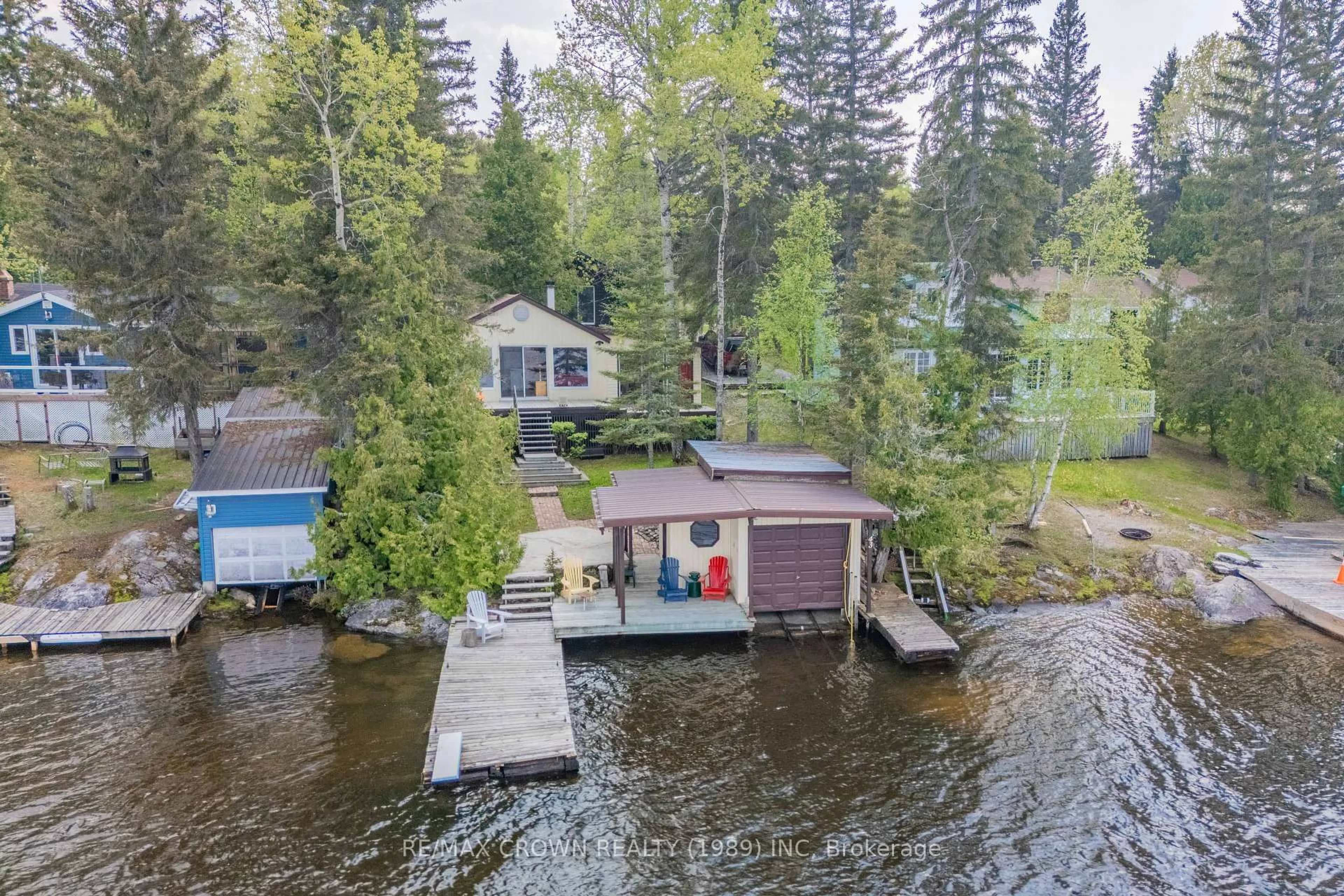 A pic from outside/outdoor area/front of a property/back of a property/a pic from drone, water/lake/river/ocean view for 43 Sailing Club Rd, Moonbeam Ontario P0L 1V0