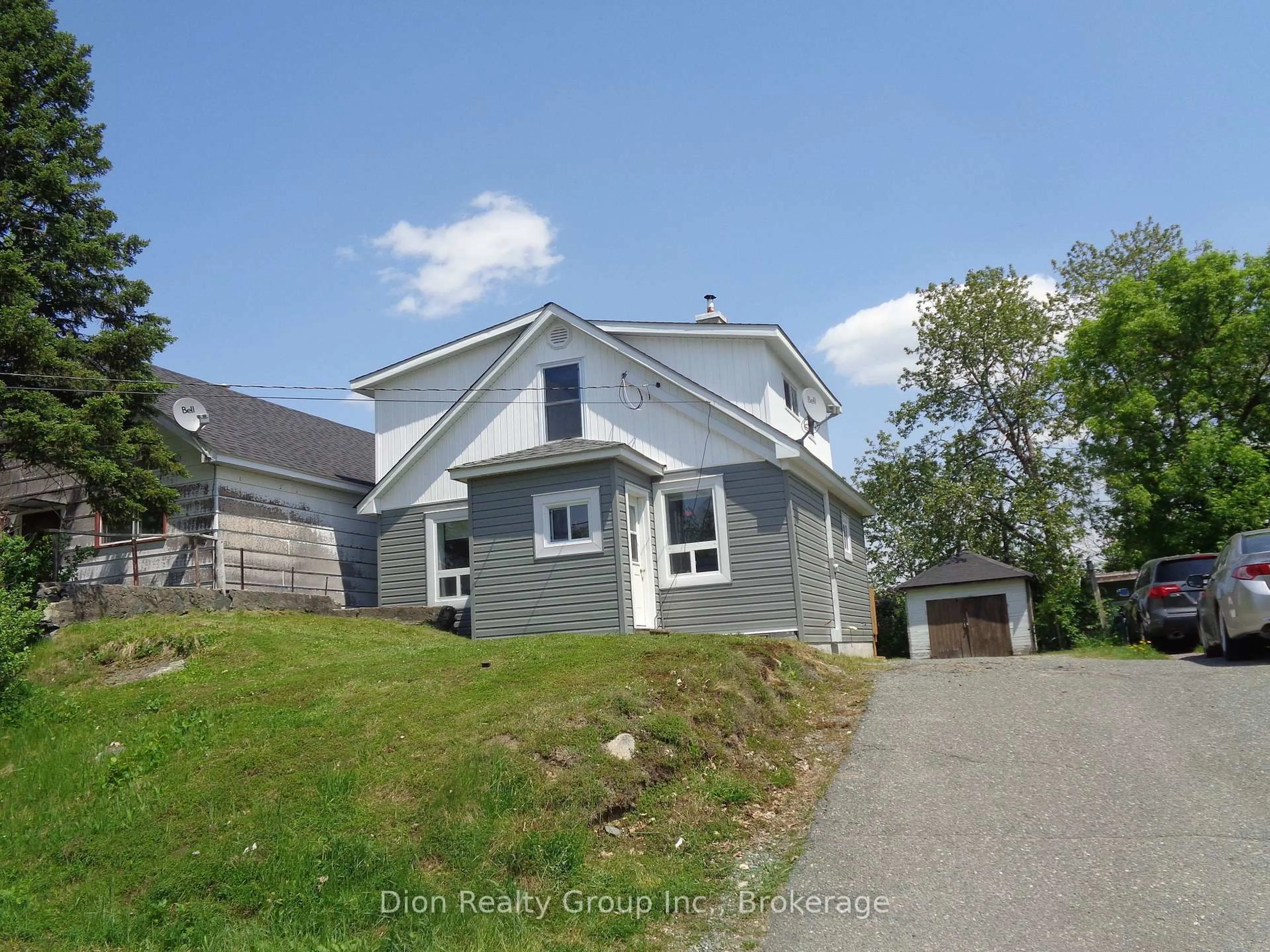 A pic from outside/outdoor area/front of a property/back of a property/a pic from drone, street for 28 Comfort St, Kirkland Lake Ontario P2N 3B2