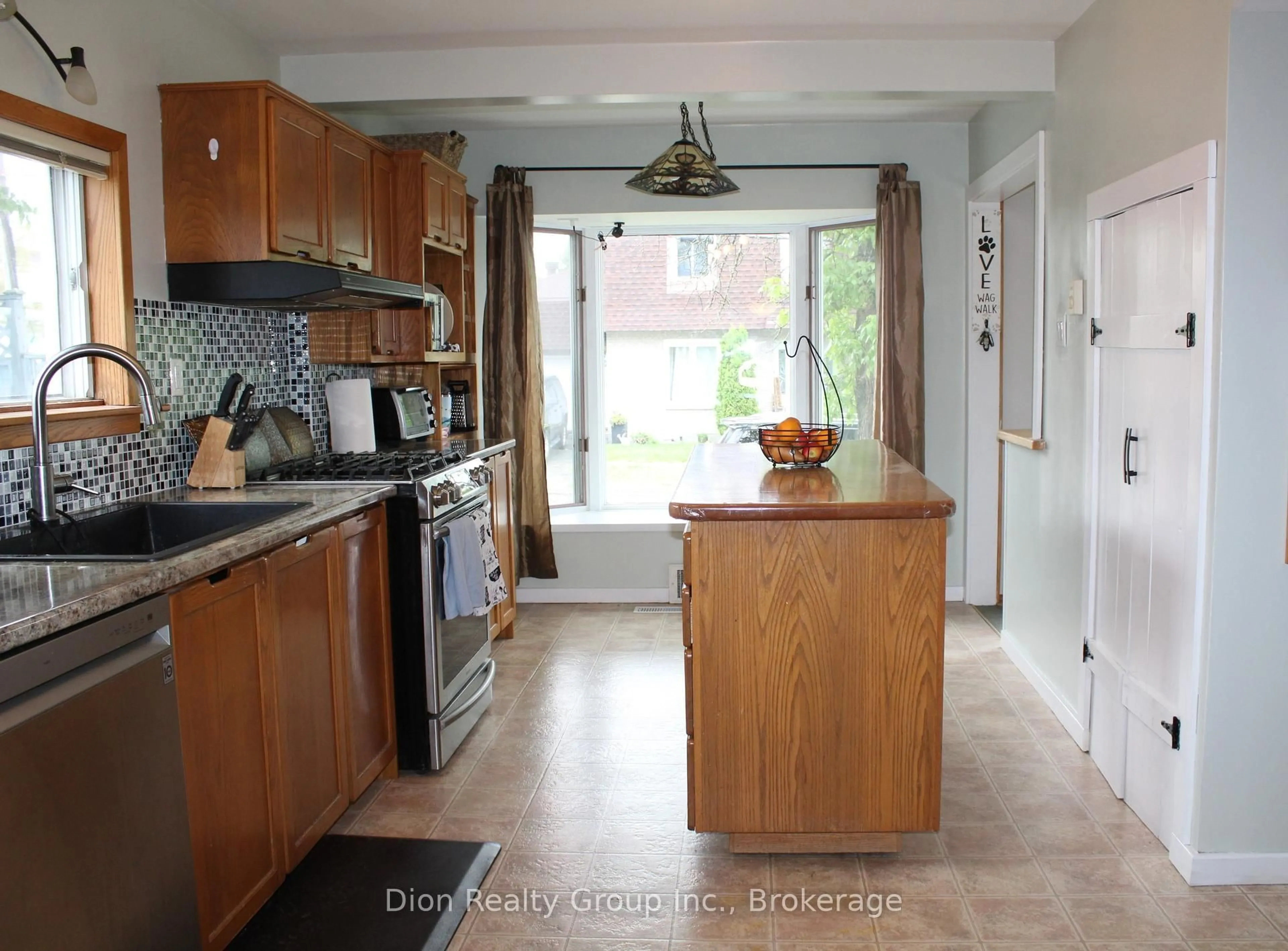 Open concept kitchen, ceramic/tile floor for 58 Third St, Kirkland Lake Ontario P2N 1S4