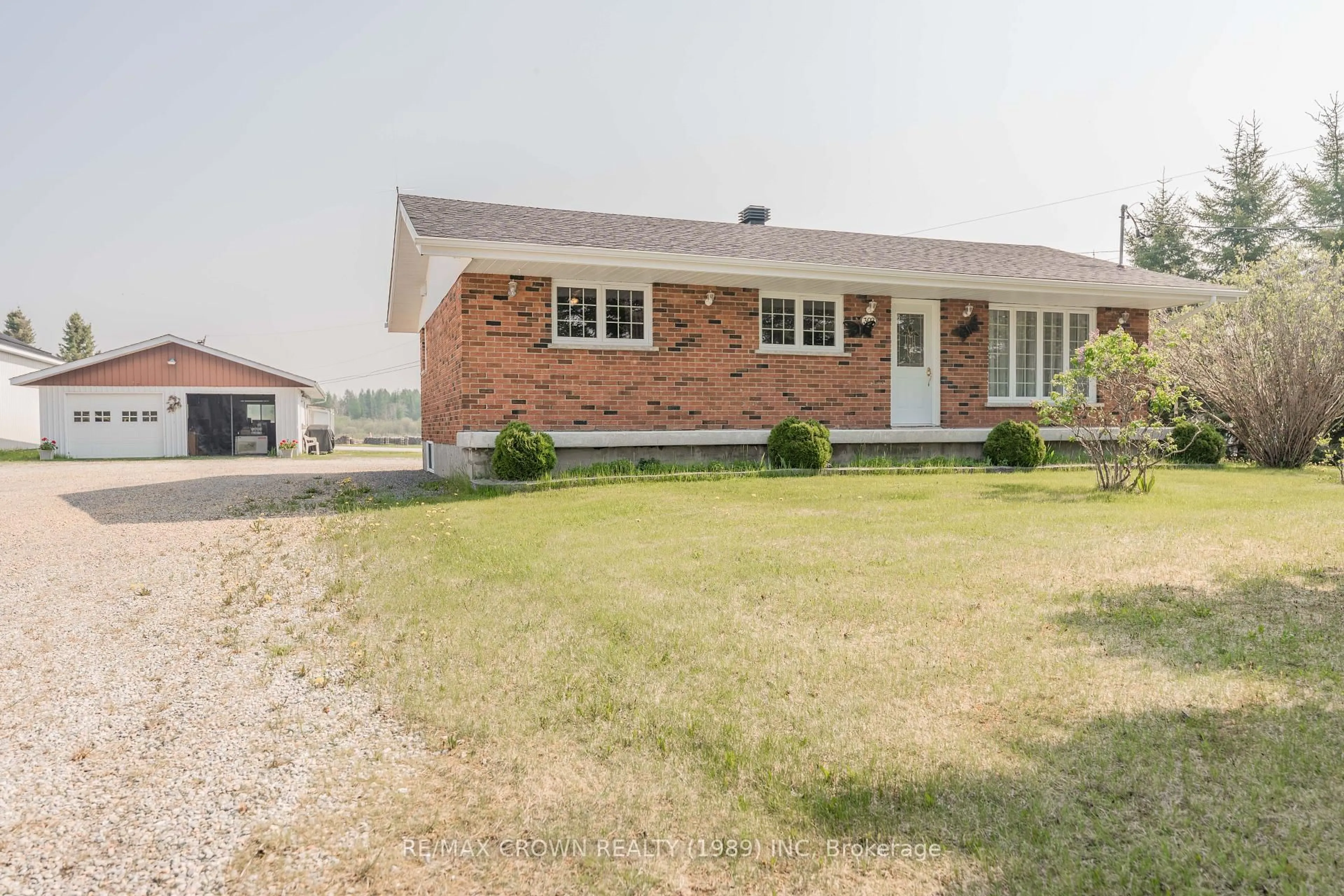 Home with brick exterior material, street for 302 Government Rd, Val Rita-Harty Ontario P0L 1M0
