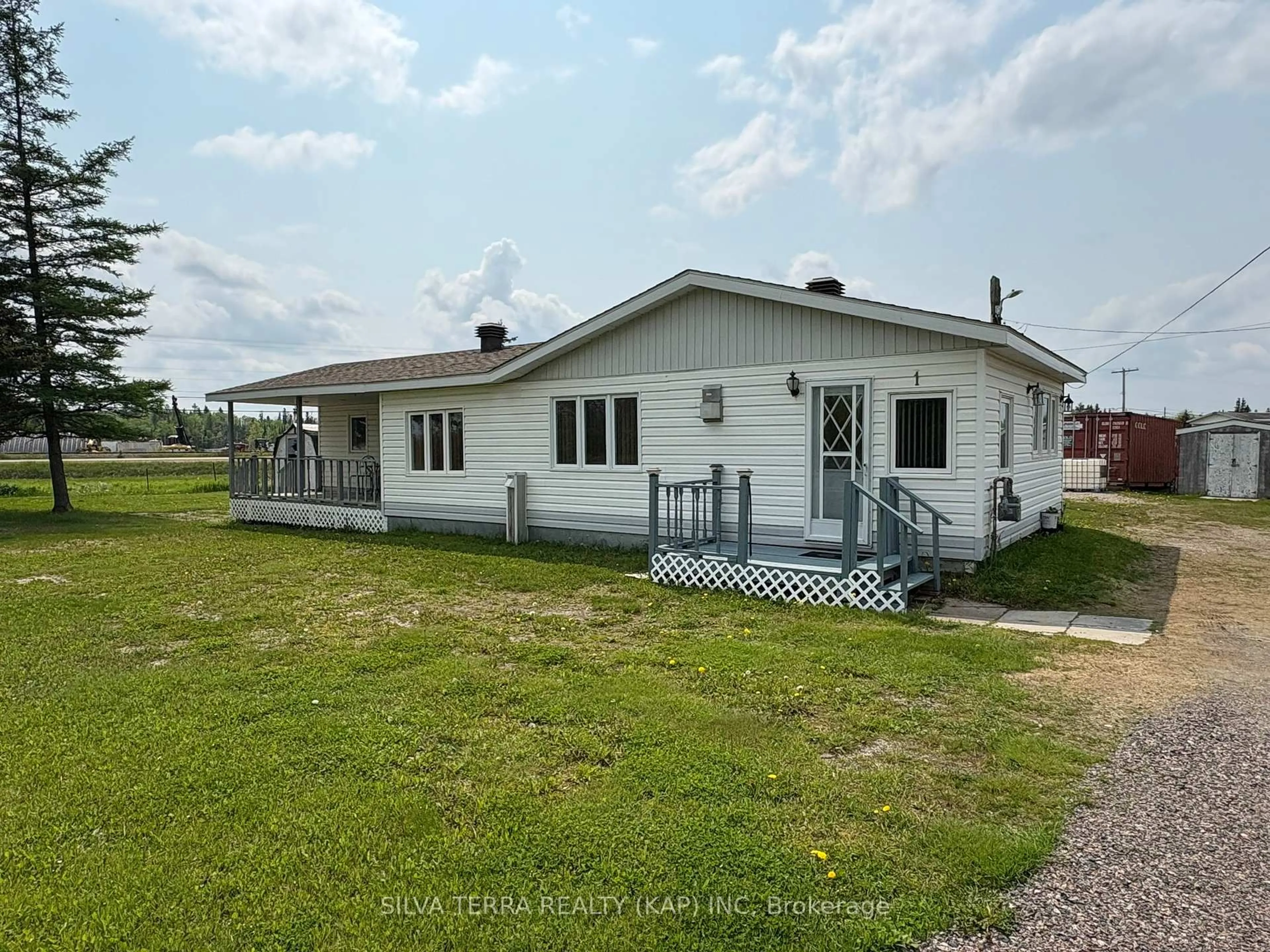 A pic from outside/outdoor area/front of a property/back of a property/a pic from drone, building for 1 Owens Rd, Kapuskasing Ontario P0L 2G0
