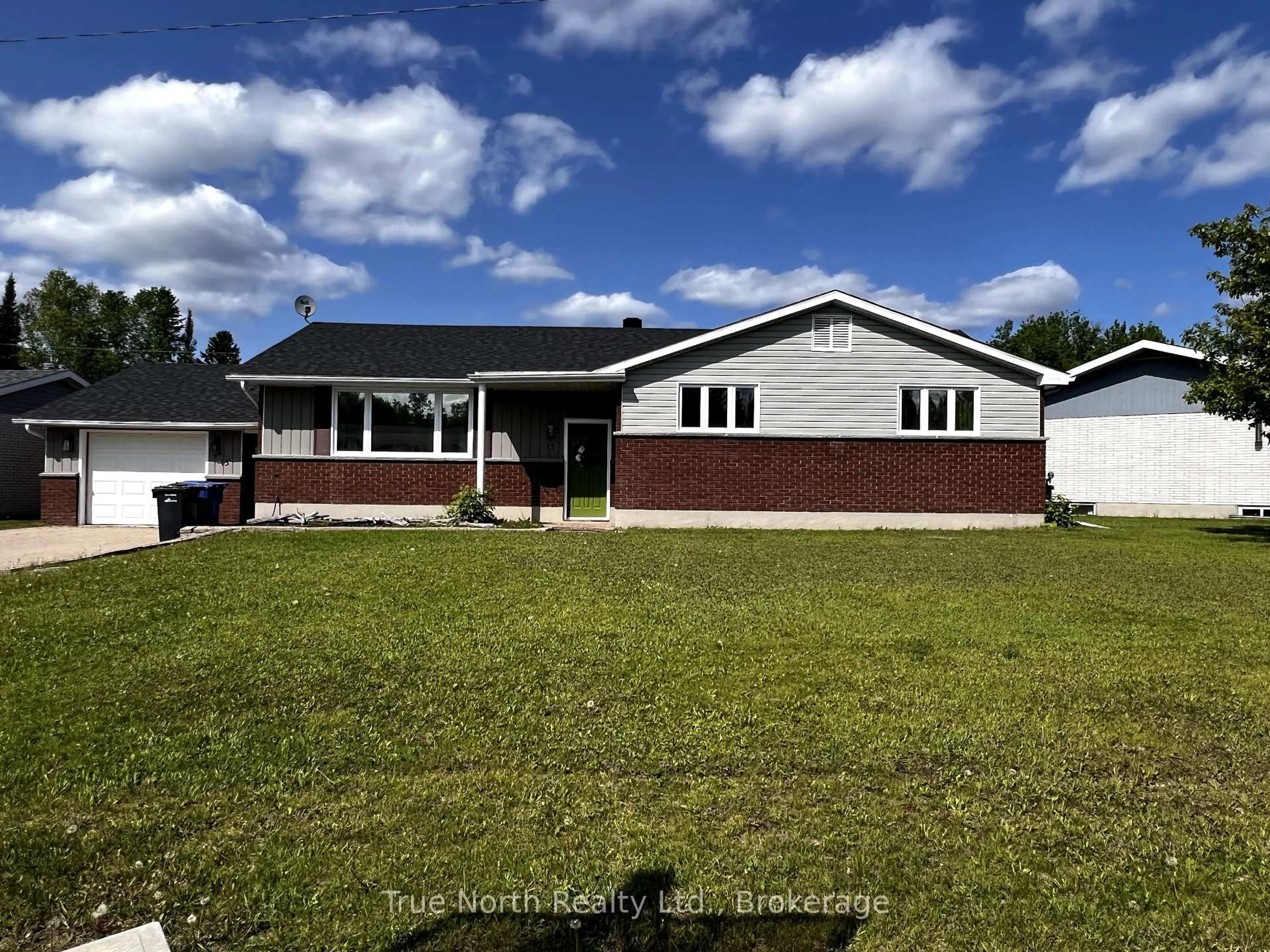 Home with vinyl exterior material, street for 15 Seaborne Cres, Kapuskasing Ontario P5N 1L8