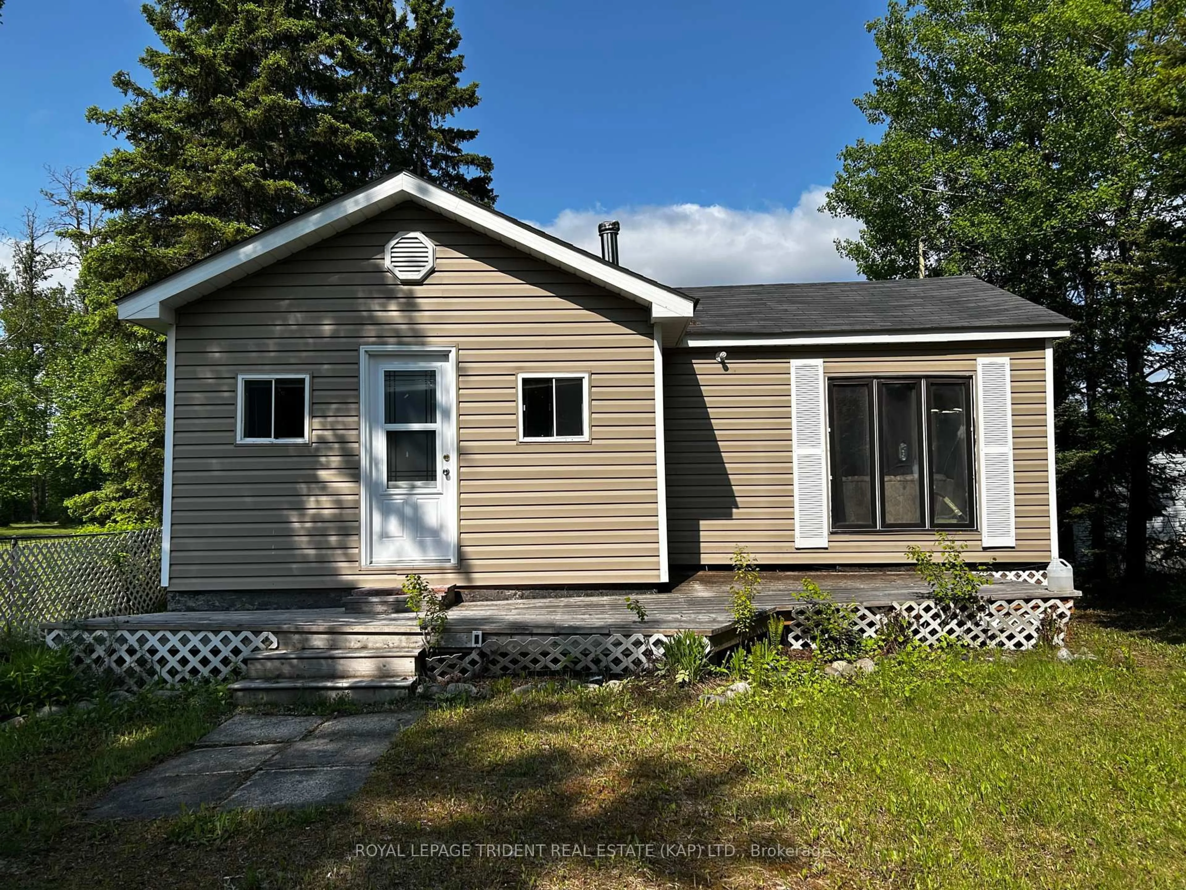 Home with vinyl exterior material, street for 59 Remi Lake Rd, Moonbeam Ontario P0L 1V0