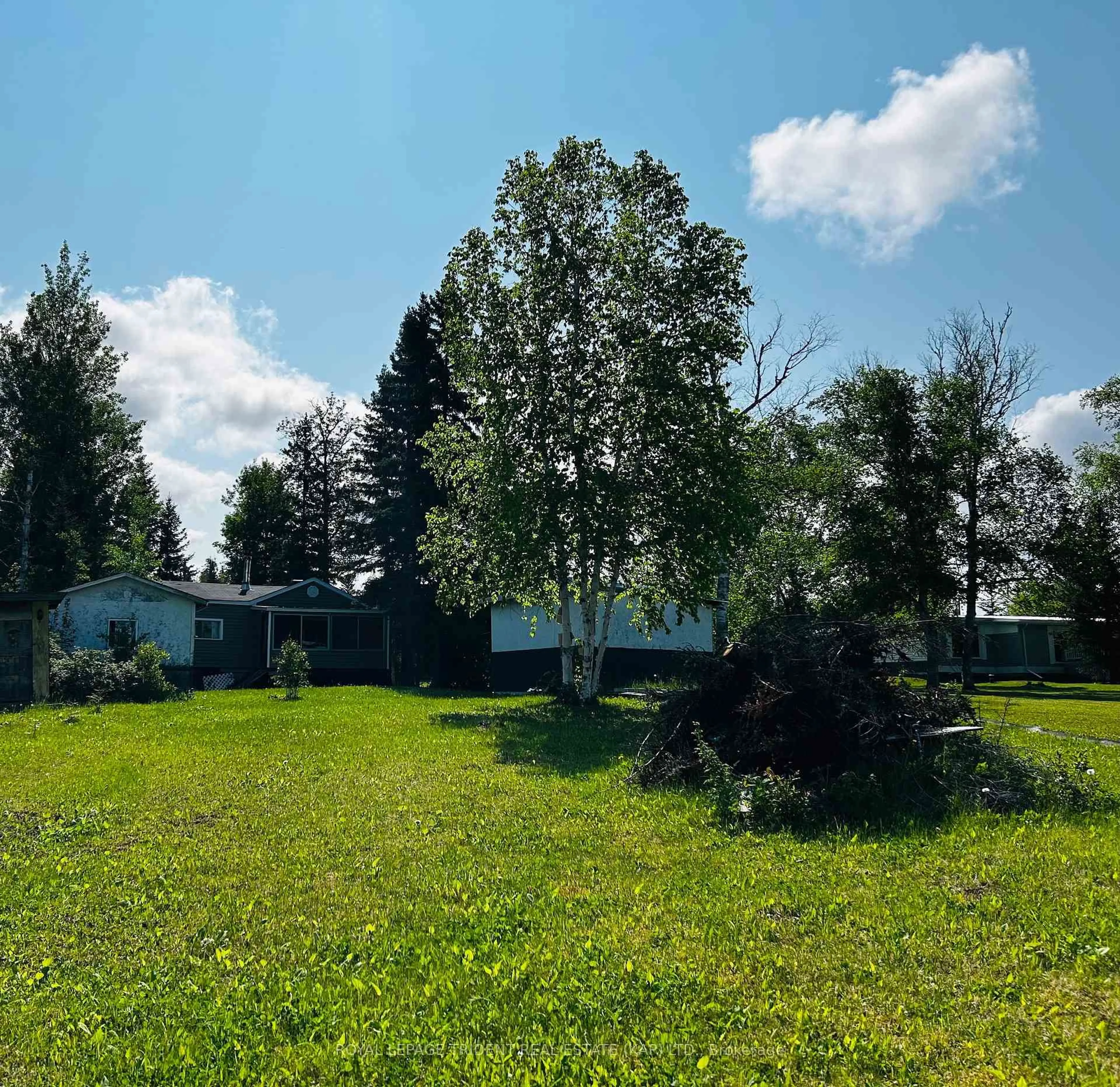 A pic from outside/outdoor area/front of a property/back of a property/a pic from drone, forest/trees view for 59 Remi Lake Rd, Moonbeam Ontario P0L 1V0