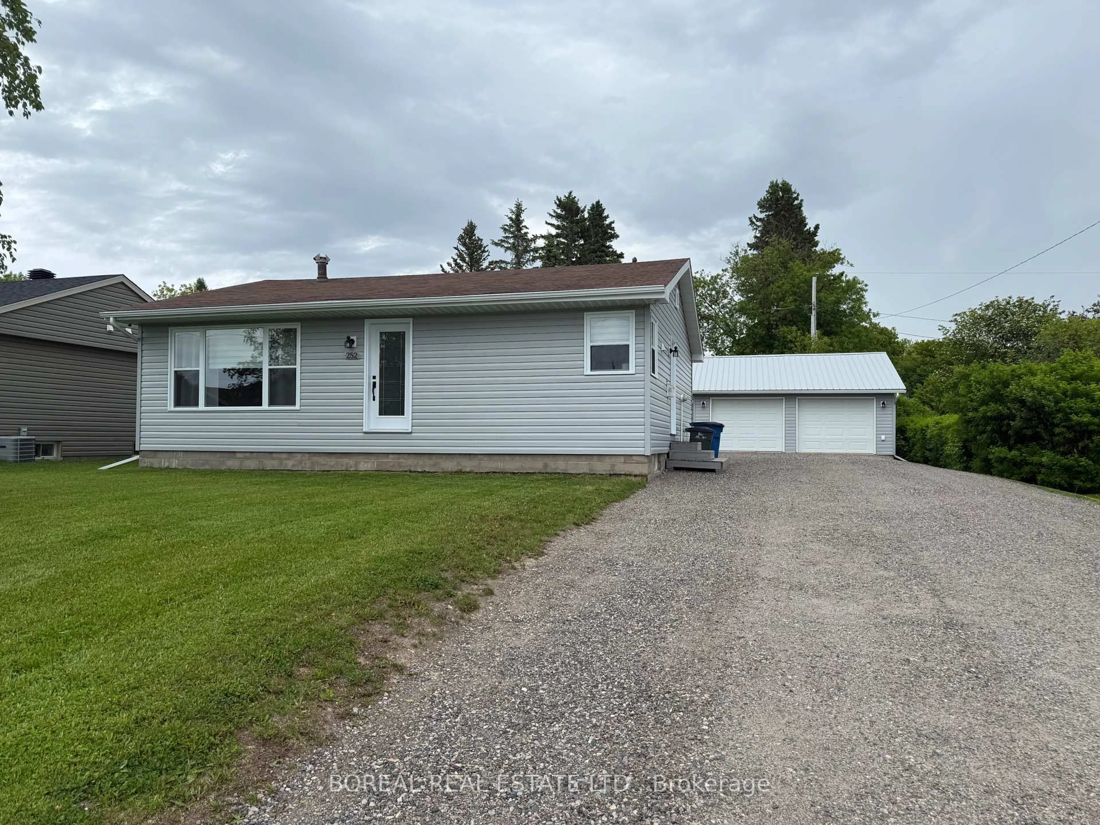 A pic from outside/outdoor area/front of a property/back of a property/a pic from drone, unknown for 252 Fourteenth Ave, Cochrane Ontario P0L 1C0