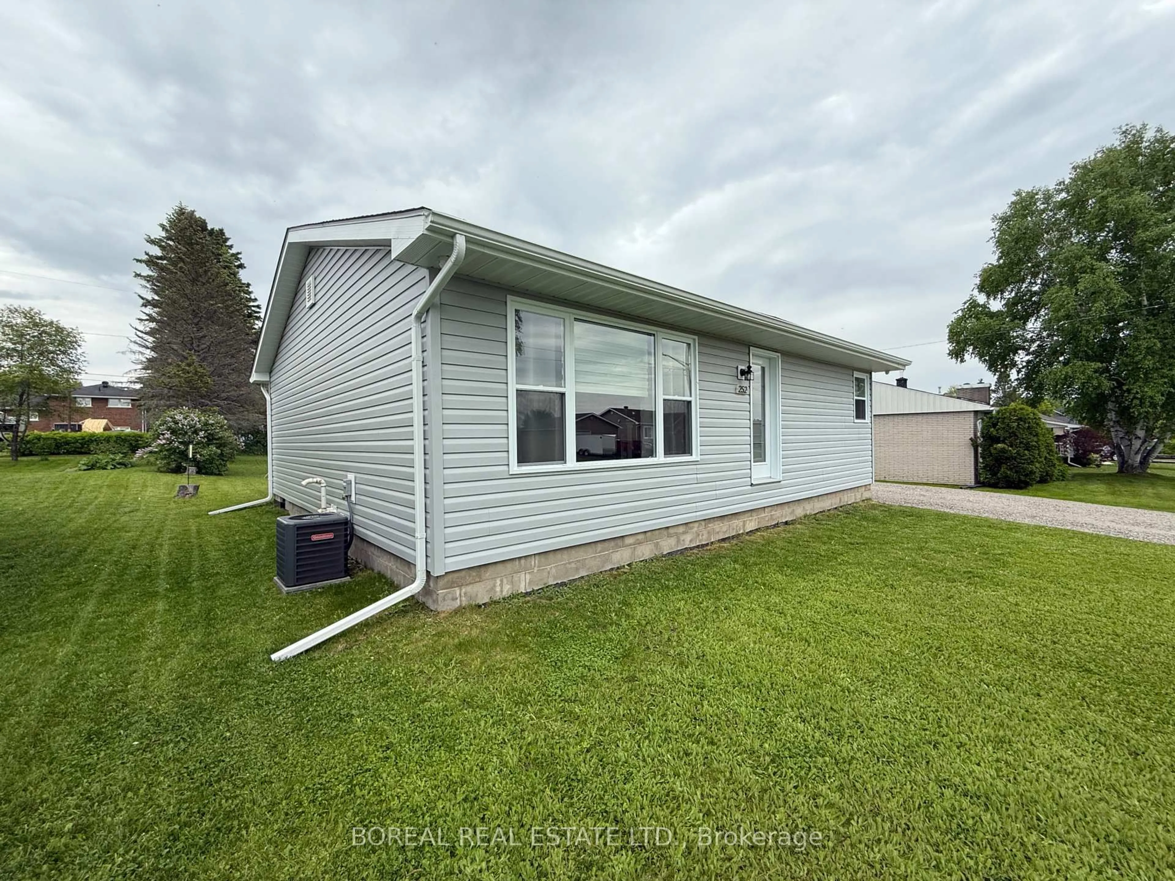 A pic from outside/outdoor area/front of a property/back of a property/a pic from drone, water/lake/river/ocean view for 252 Fourteenth Ave, Cochrane Ontario P0L 1C0