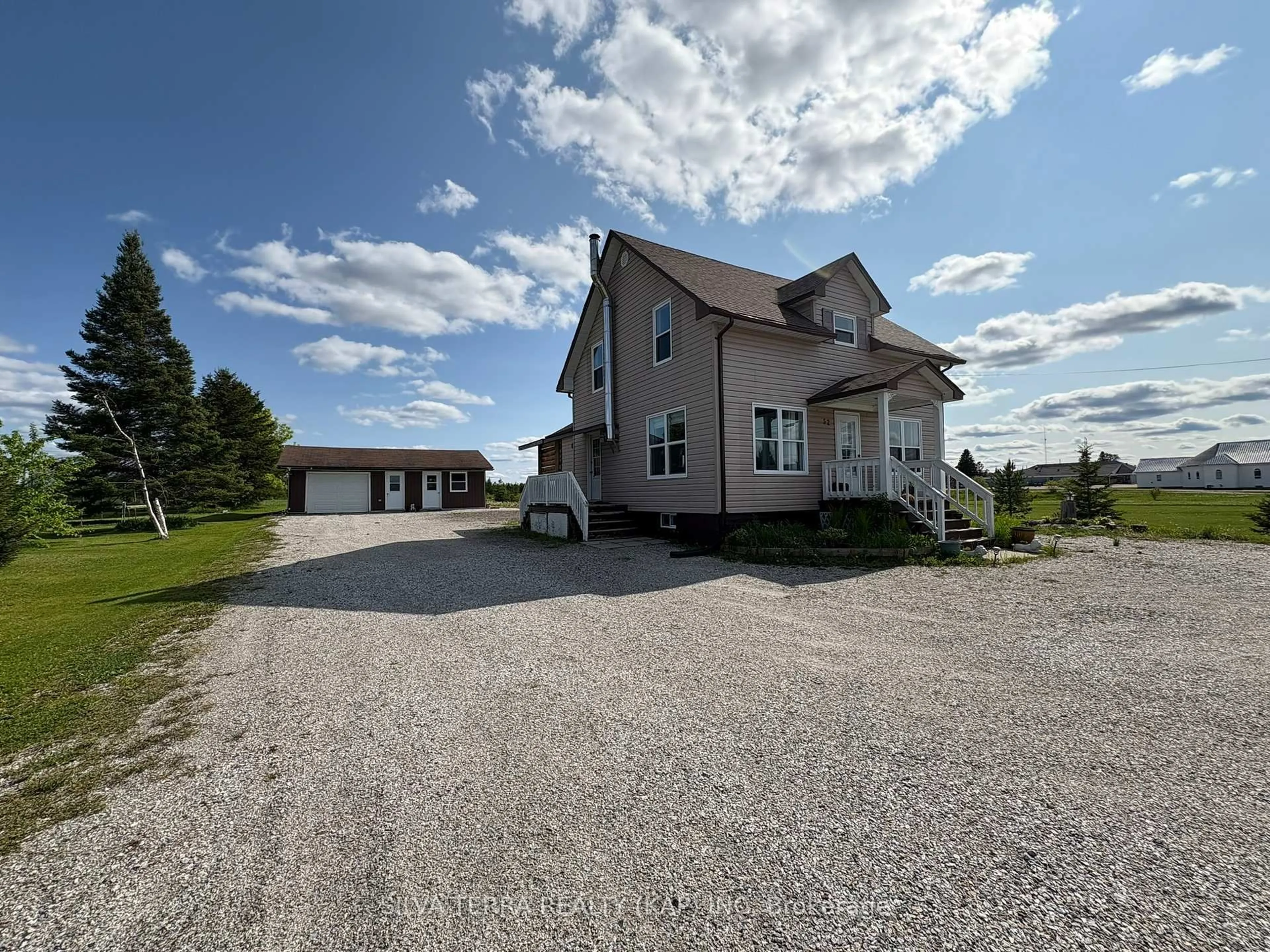 A pic from outside/outdoor area/front of a property/back of a property/a pic from drone, building for 52 Doyon St, Fauquier-Strickland Ontario P0L 1G0