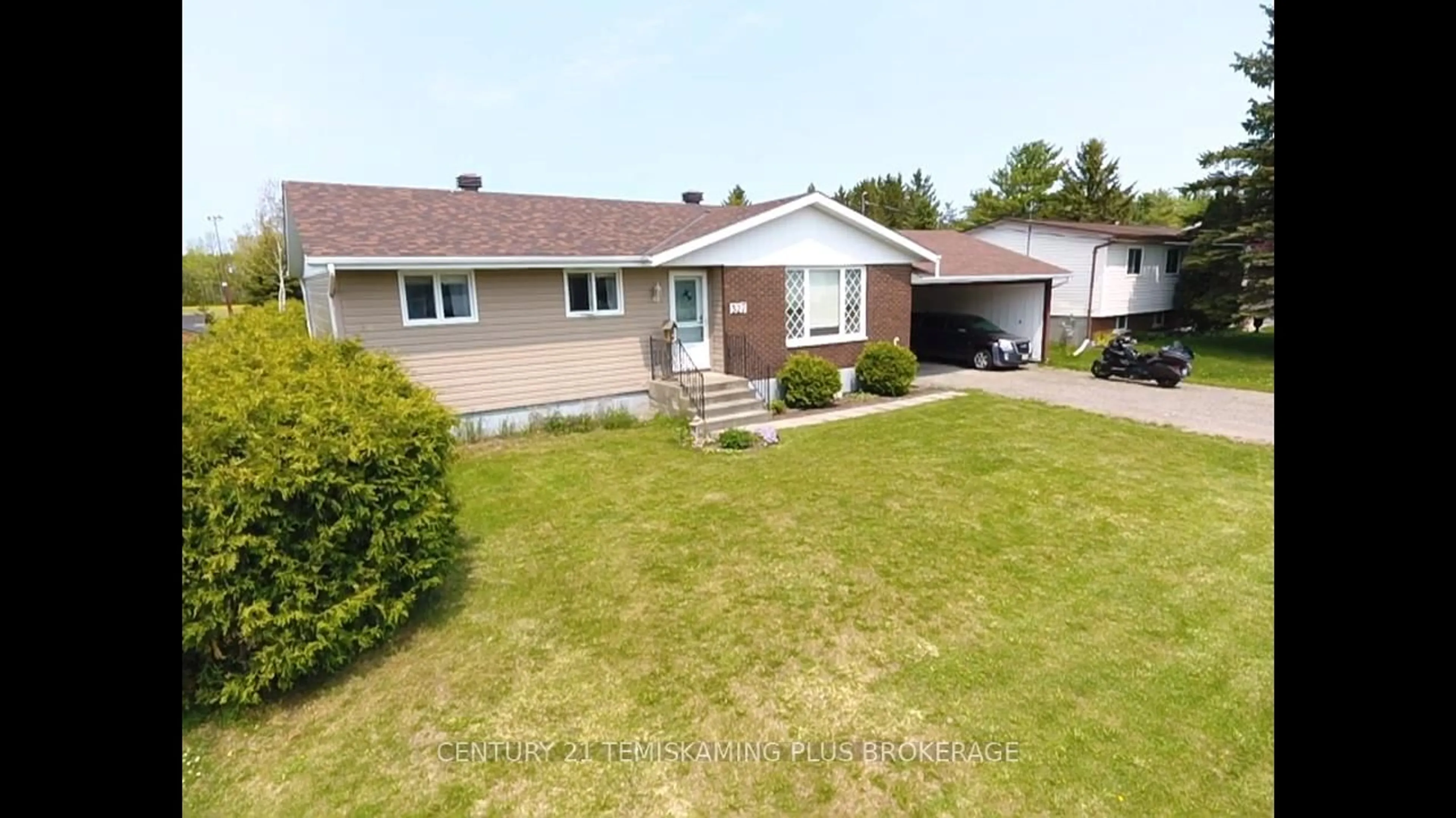 A pic from outside/outdoor area/front of a property/back of a property/a pic from drone, street for 327 Crystal Cres, Temiskaming Shores Ontario P0J 1P0