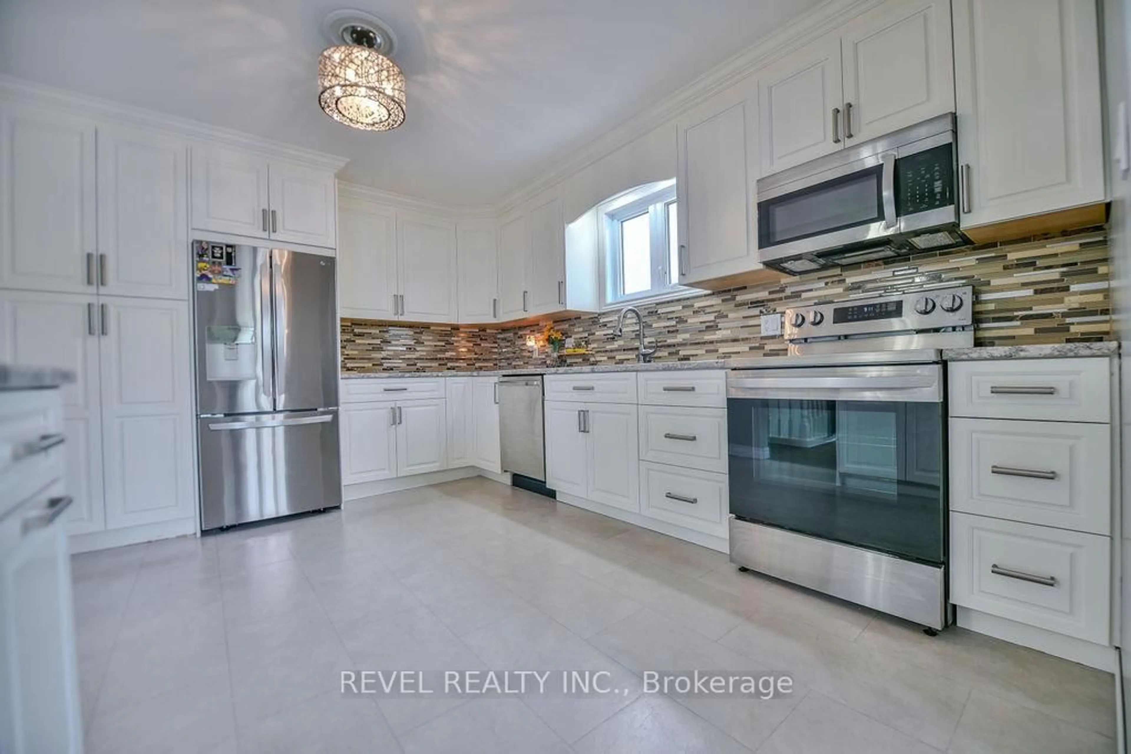 Open concept kitchen, ceramic/tile floor for 45 Jade Ave, Timmins Ontario P4N 4M3