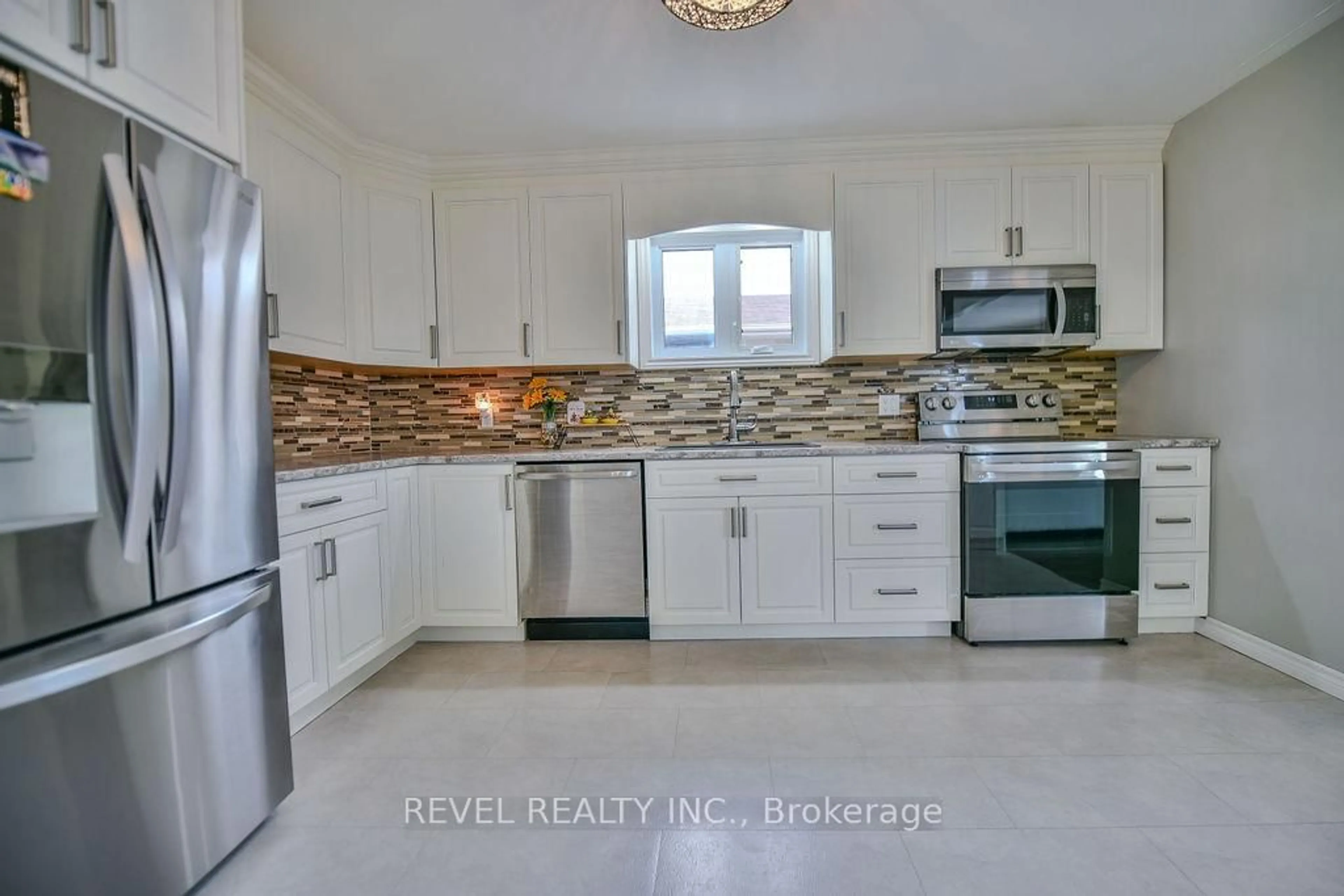 Open concept kitchen, ceramic/tile floor for 45 Jade Ave, Timmins Ontario P4N 4M3