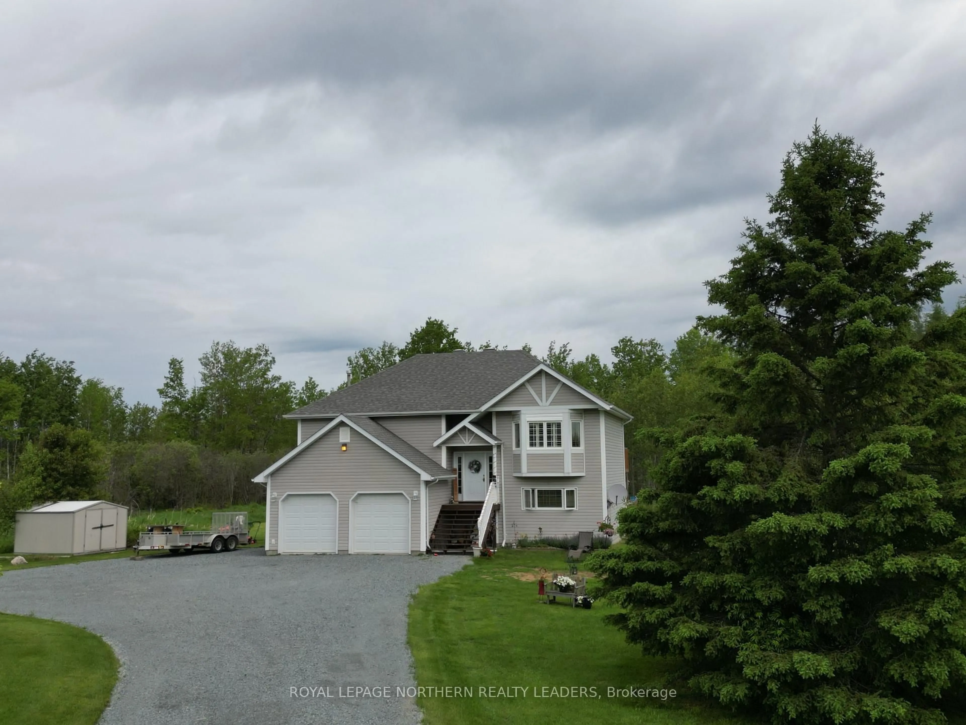 A pic from outside/outdoor area/front of a property/back of a property/a pic from drone, water/lake/river/ocean view for 1110 Sandy Falls Rd, Timmins Ontario P4N 7C3
