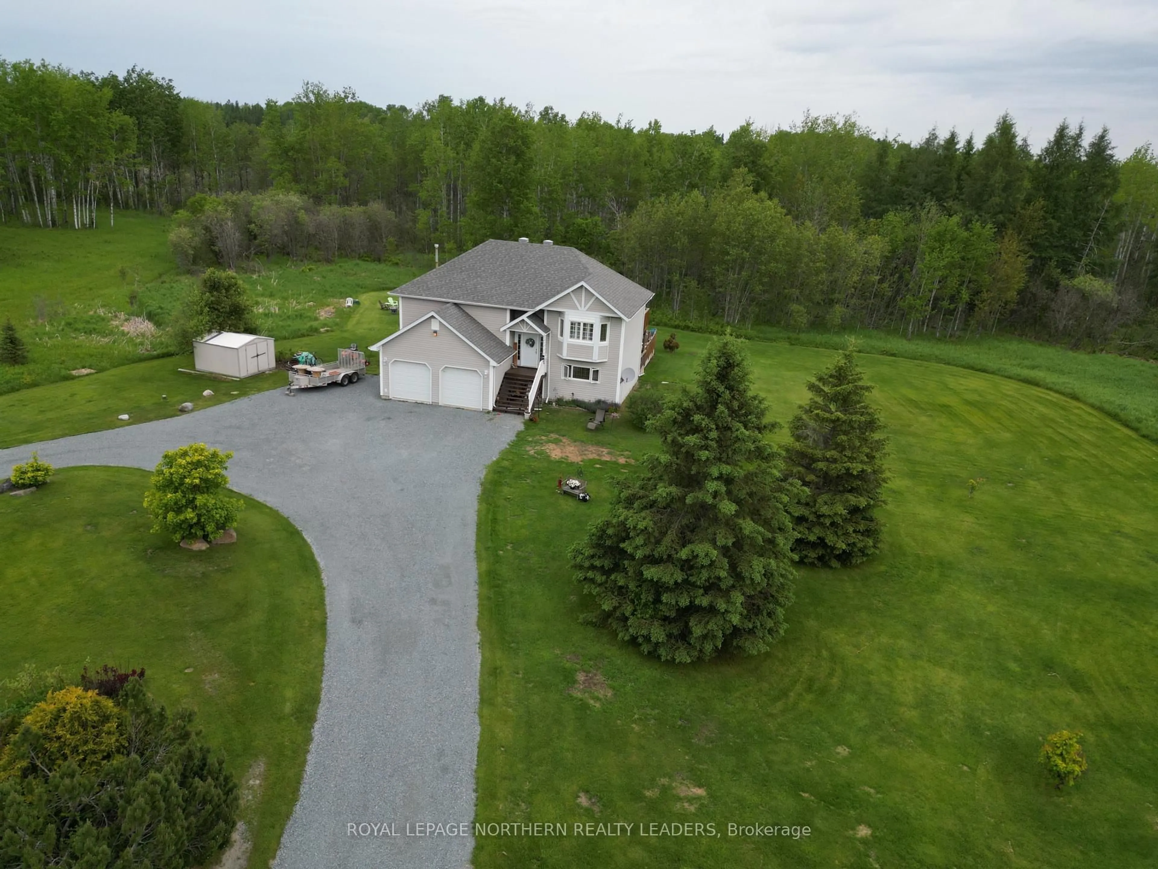 A pic from outside/outdoor area/front of a property/back of a property/a pic from drone, unknown for 1110 Sandy Falls Rd, Timmins Ontario P4N 7C3