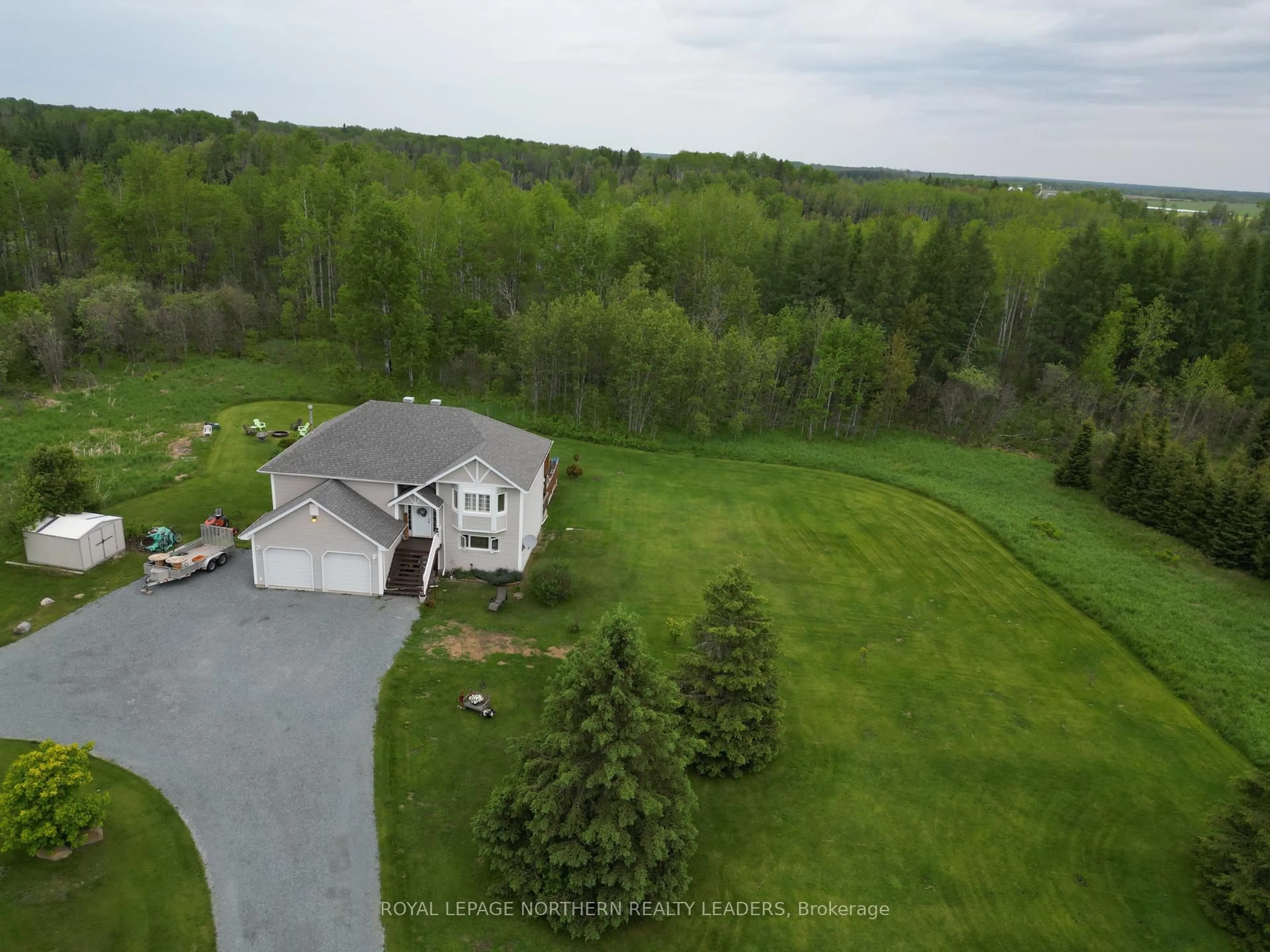 A pic from outside/outdoor area/front of a property/back of a property/a pic from drone, water/lake/river/ocean view for 1110 Sandy Falls Rd, Timmins Ontario P4N 7C3