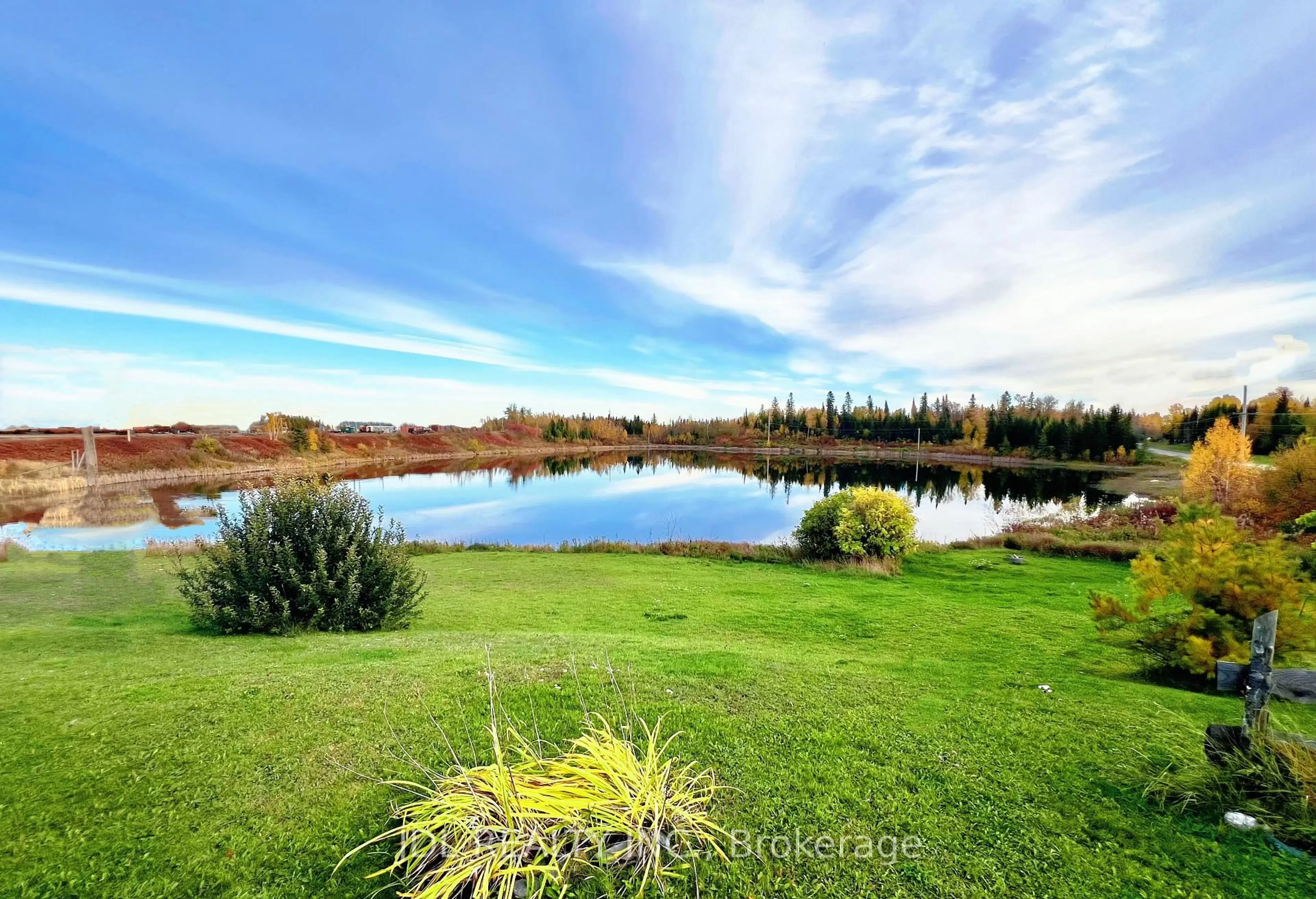A pic from outside/outdoor area/front of a property/back of a property/a pic from drone, water/lake/river/ocean view for 167 2nd St, Cochrane Ontario P0L 1C0