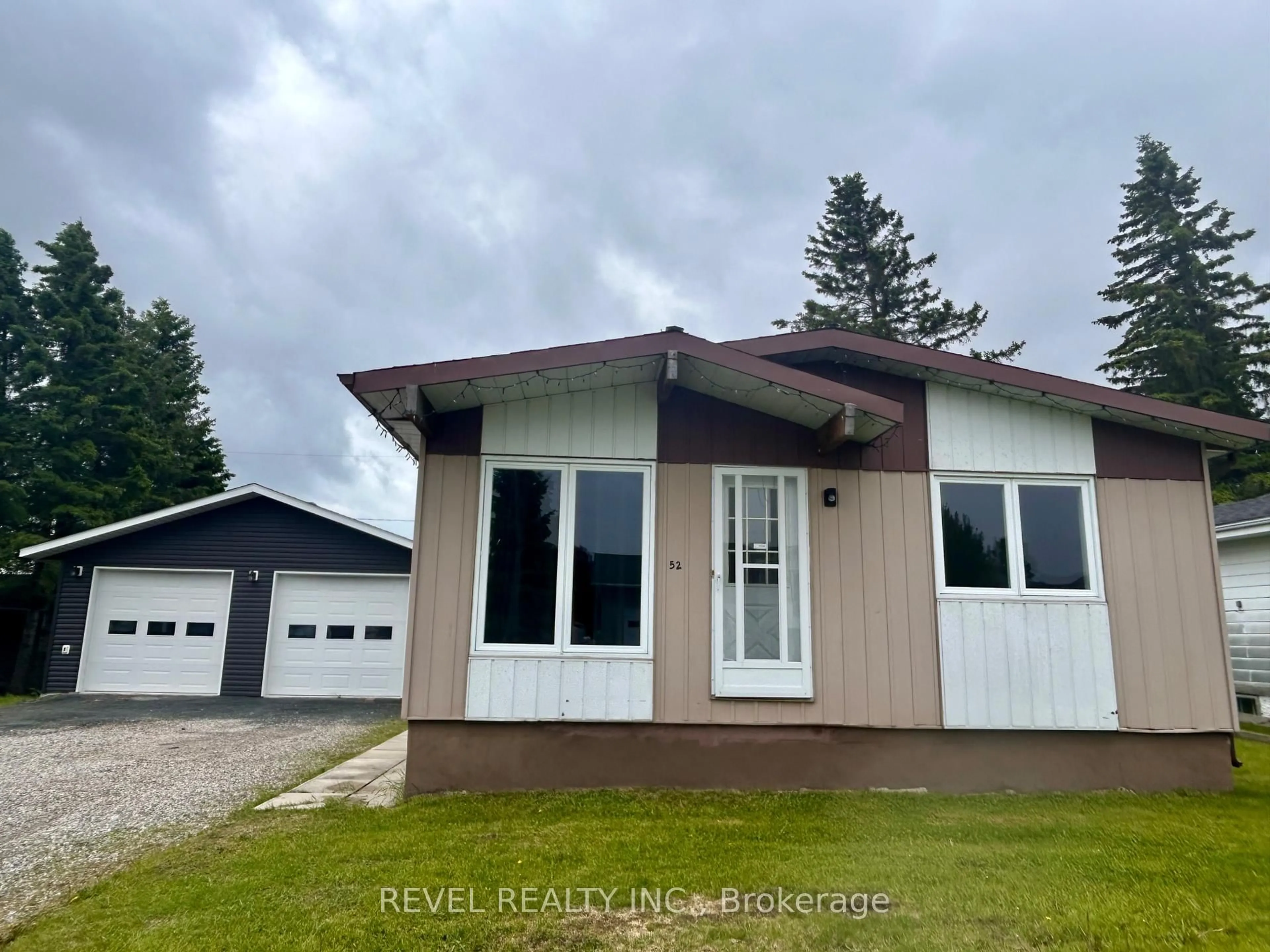 Home with vinyl exterior material, street for 52 Huron Rd, Cochrane Ontario P0L 1C0
