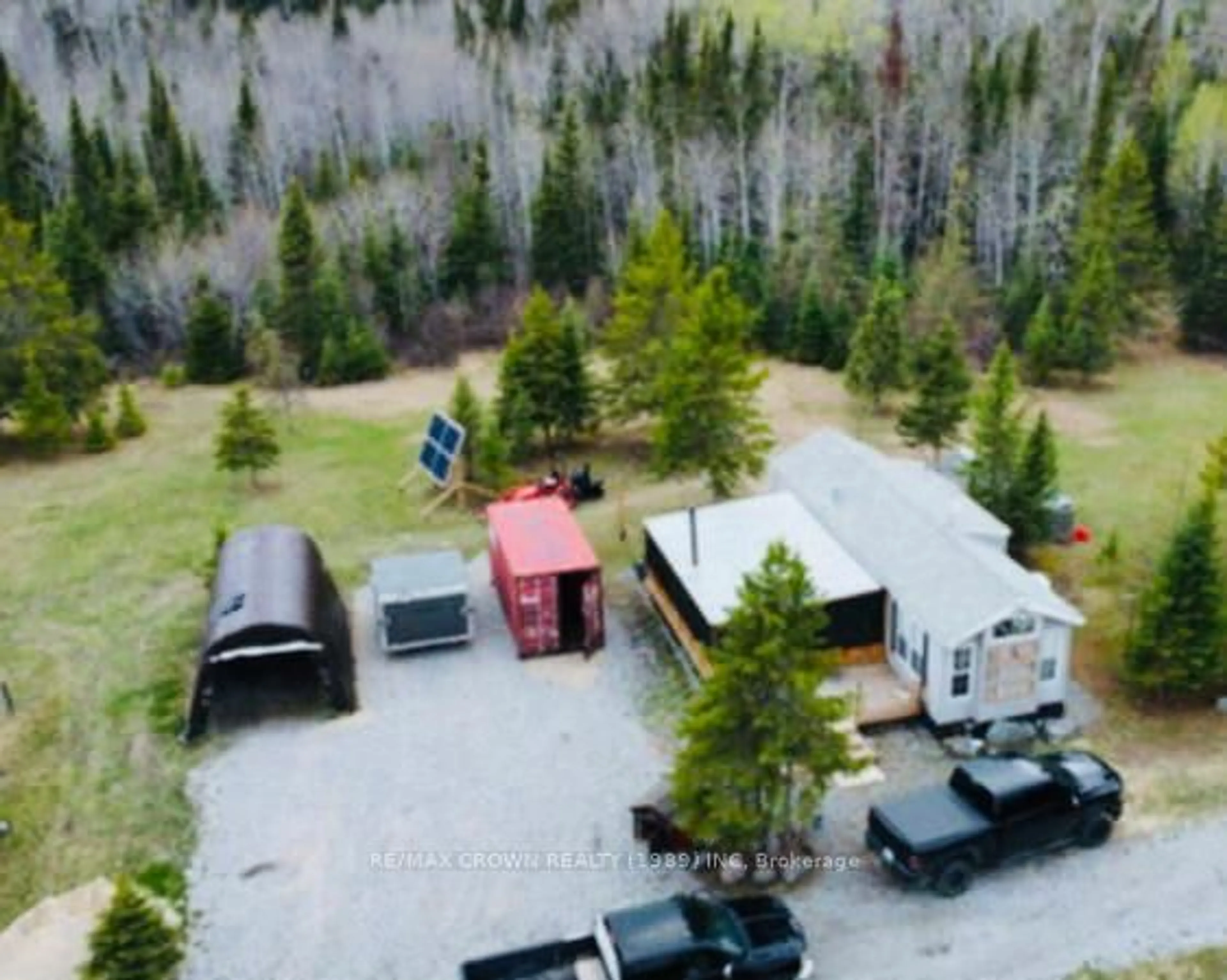 A pic from outside/outdoor area/front of a property/back of a property/a pic from drone, forest/trees view for 288 McNee St, Hearst Ontario P0L 1N0