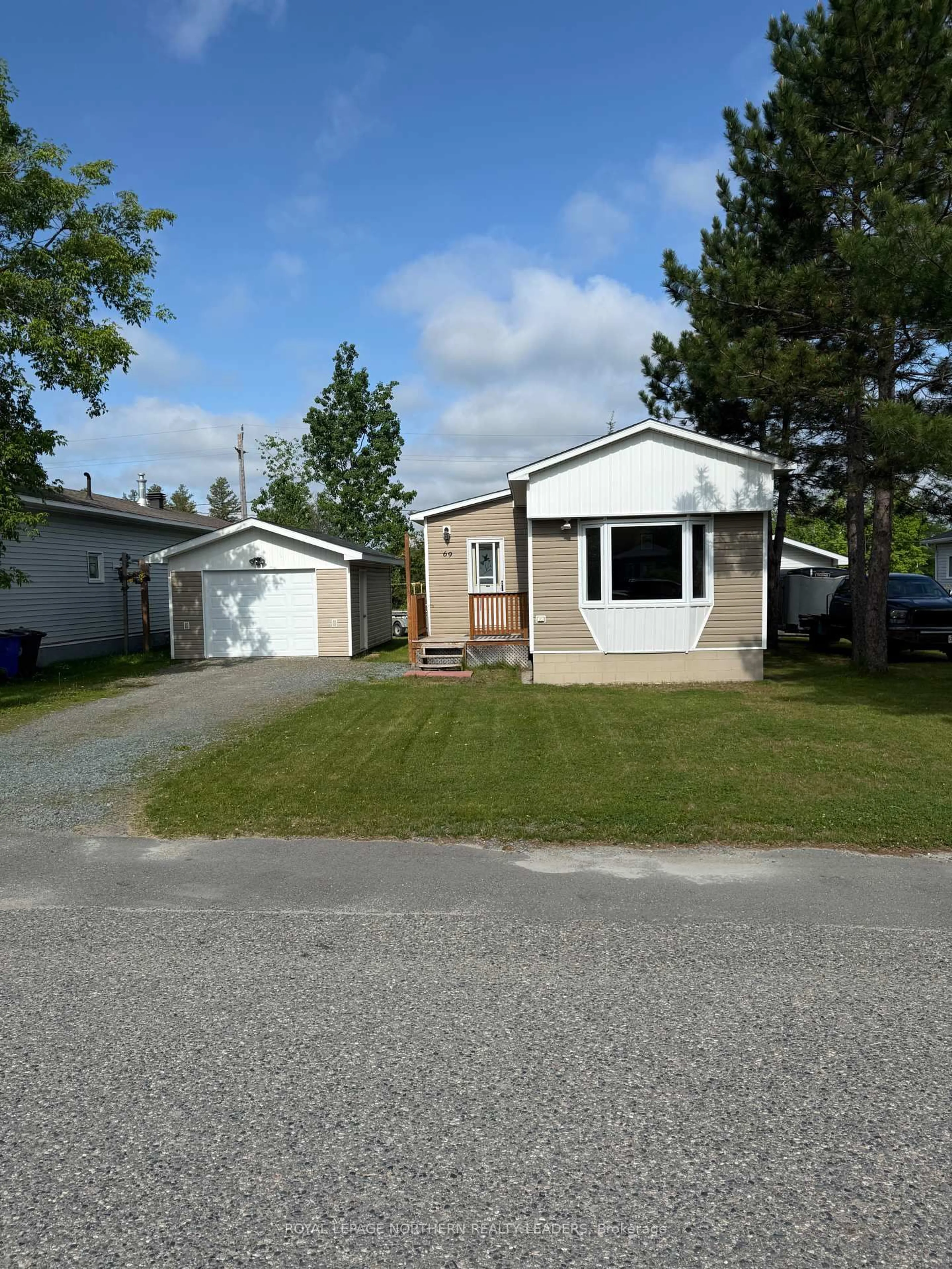 Home with vinyl exterior material, street for 69 Grasslands Rd, Timmins Ontario P4R 8R9