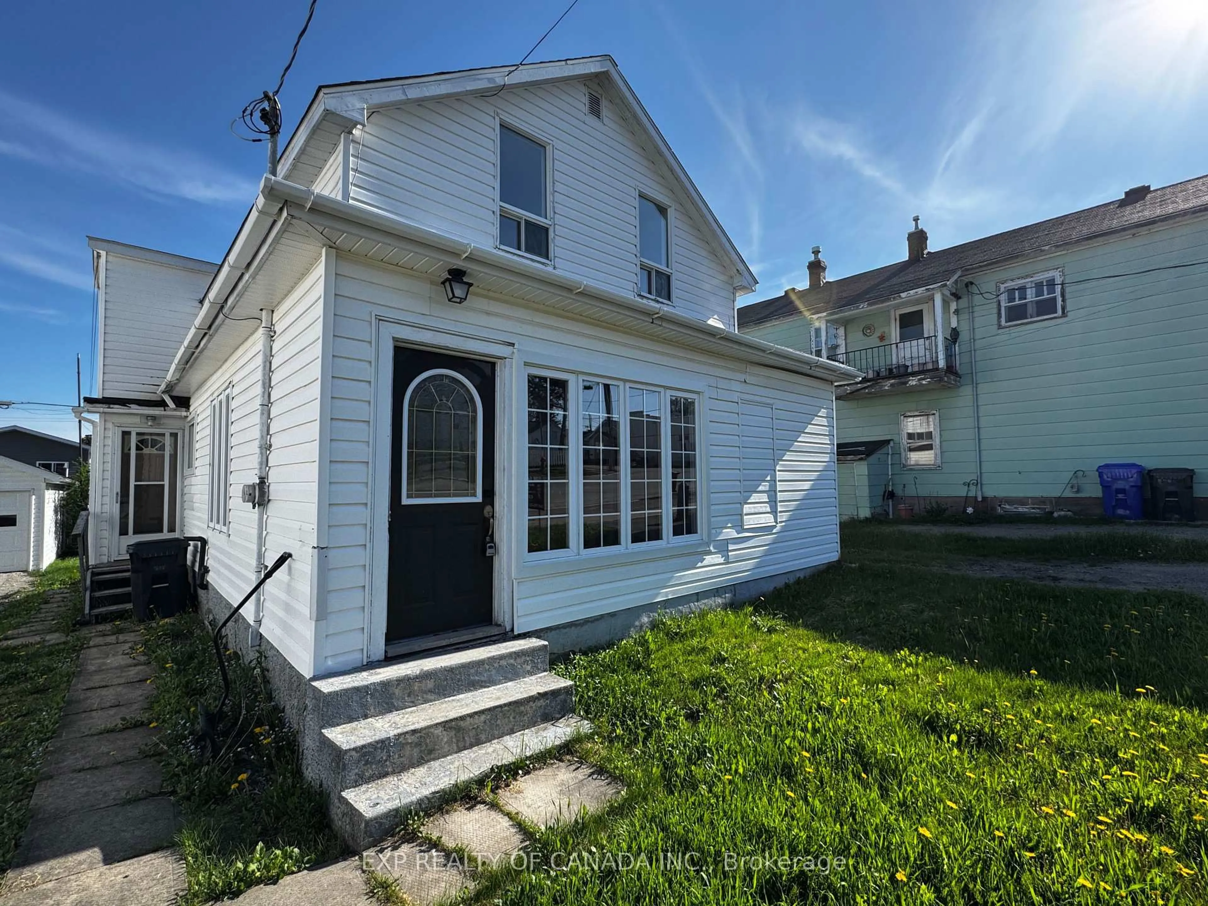 Home with vinyl exterior material, street for 35 Taylor Ave, Kirkland Lake Ontario P2N 2L2