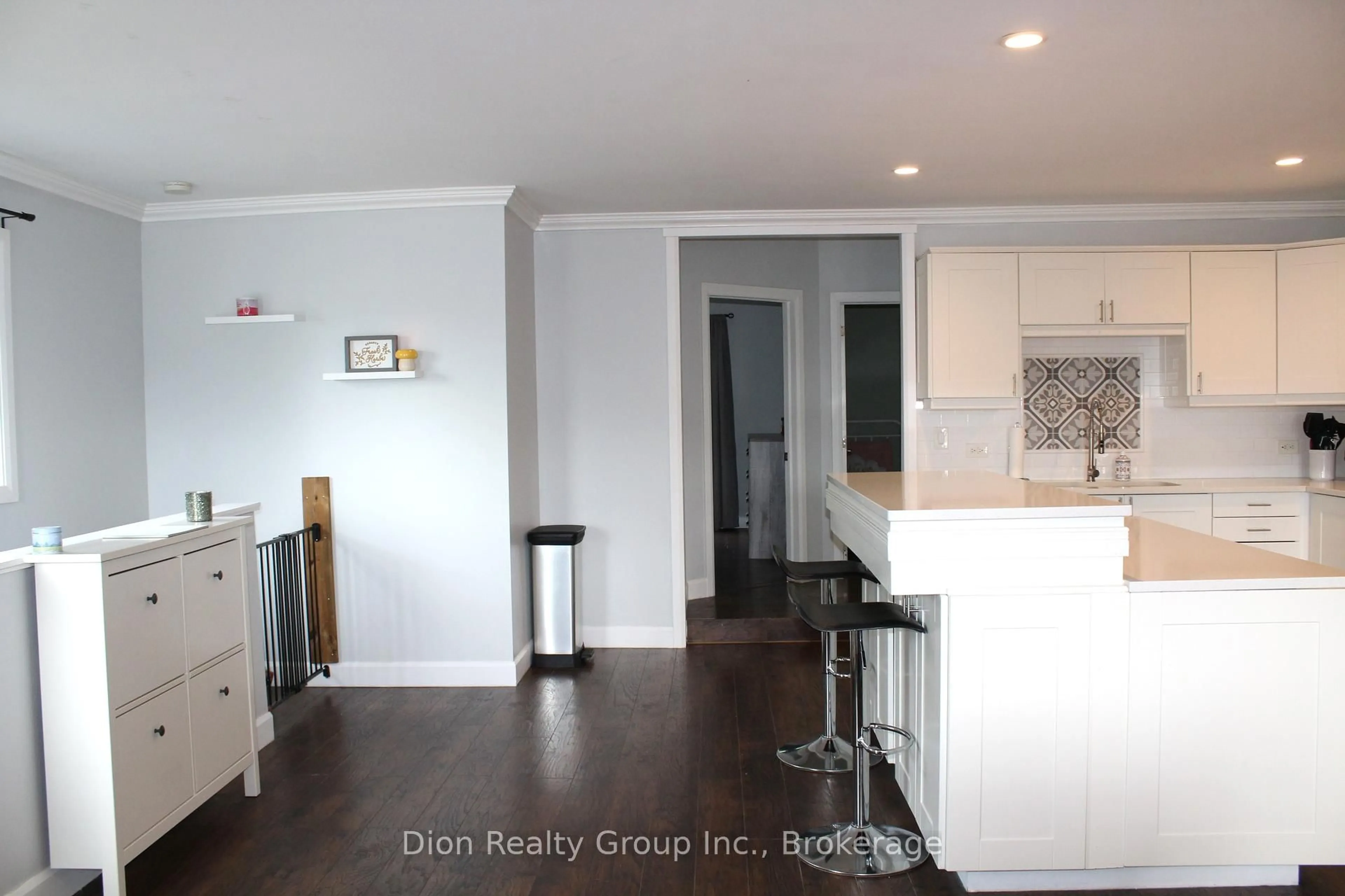Open concept kitchen, wood/laminate floor for 49 Queen St, Kirkland Lake Ontario P2N 2R2