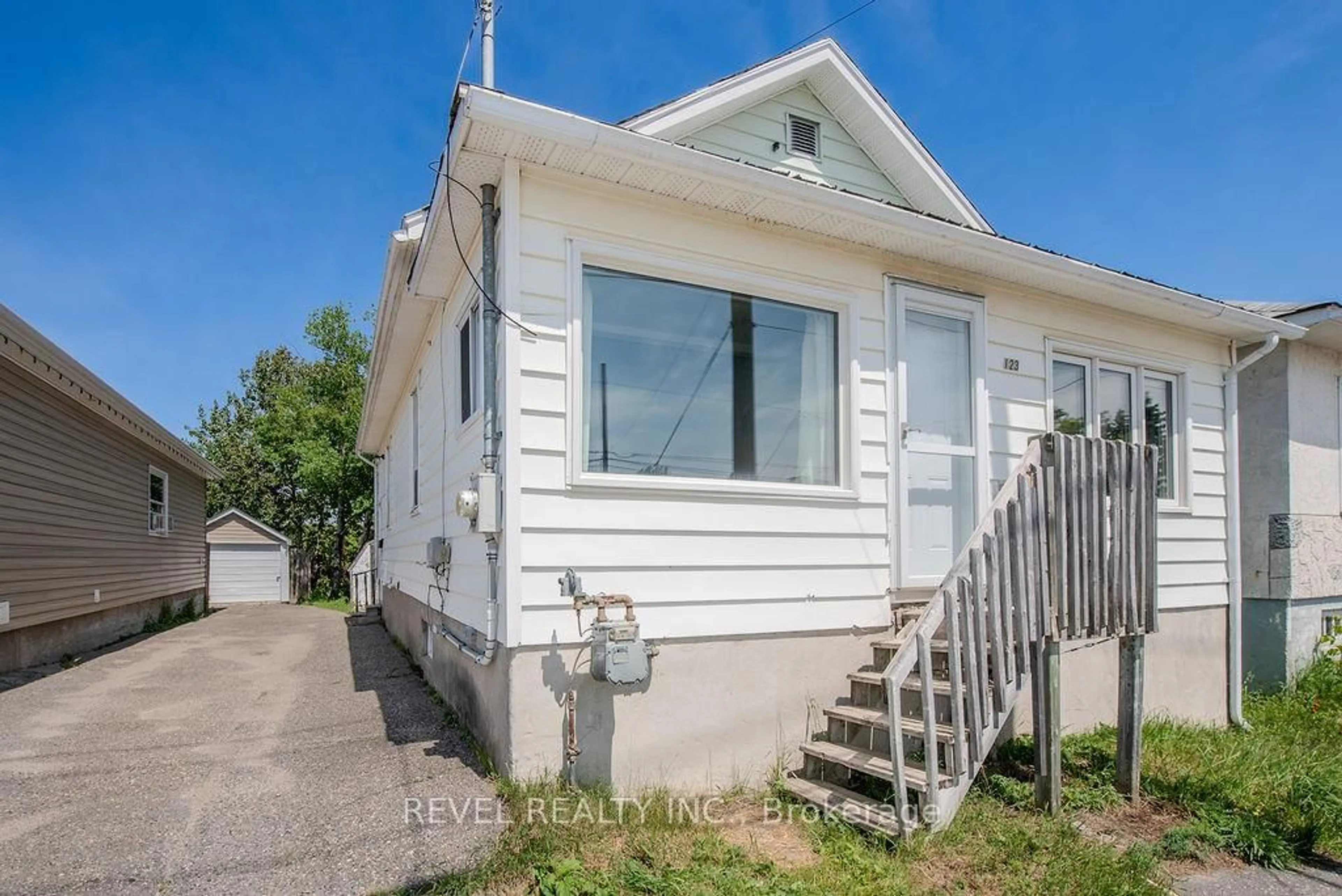 Home with vinyl exterior material, street for 123 Croatia Ave, Timmins Ontario P0N 1G0