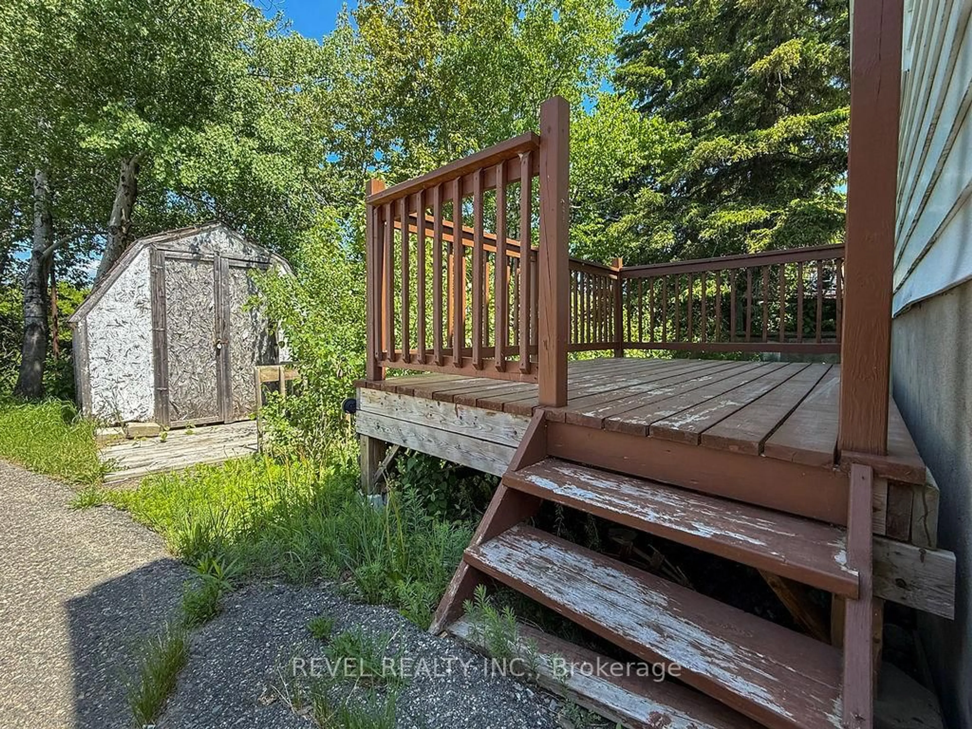 A pic from outside/outdoor area/front of a property/back of a property/a pic from drone, forest/trees view for 123 Croatia Ave, Timmins Ontario P0N 1G0