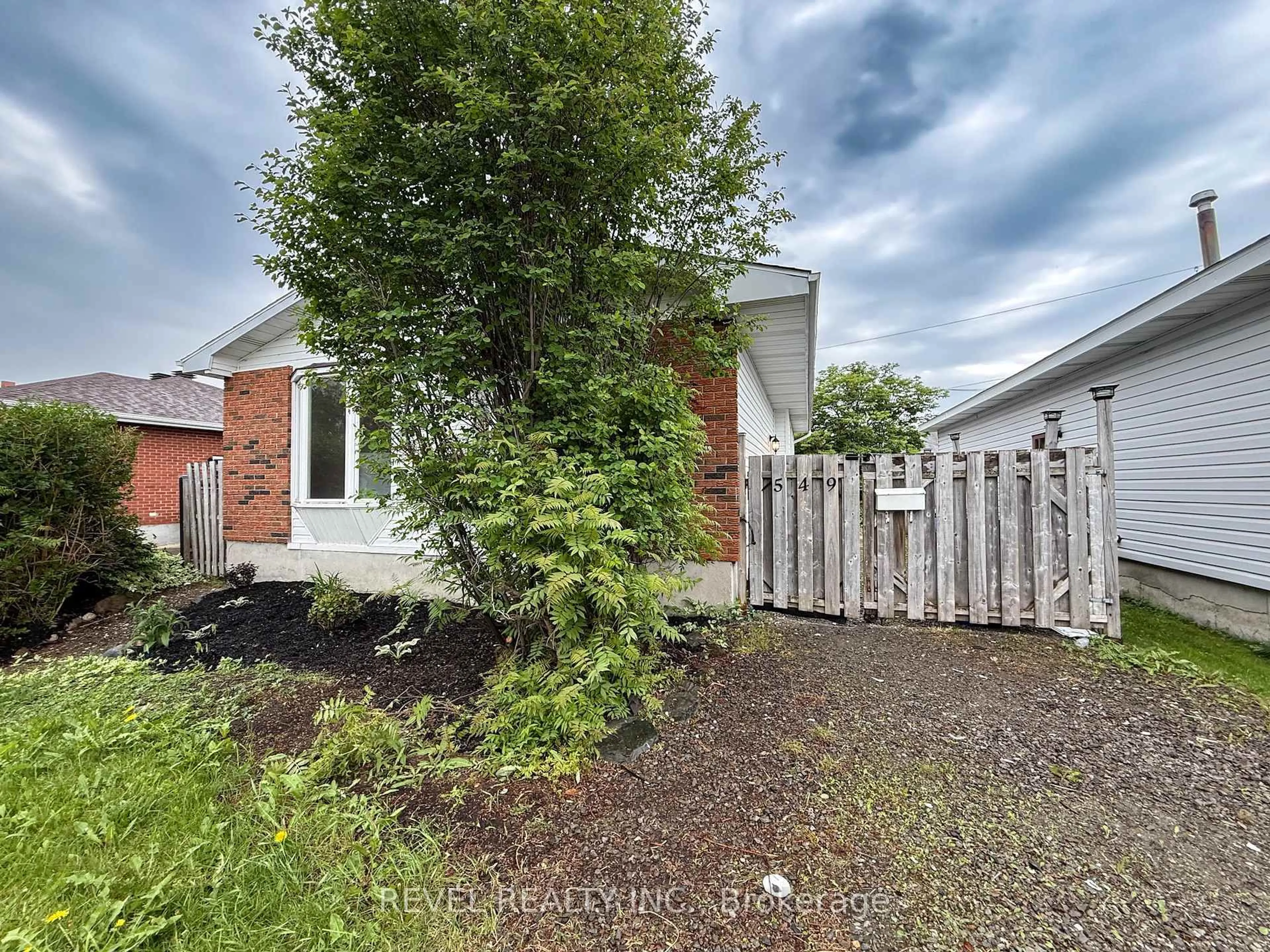 A pic from outside/outdoor area/front of a property/back of a property/a pic from drone, street for 549 Spooner Dr, Timmins Ontario P4N 4R6