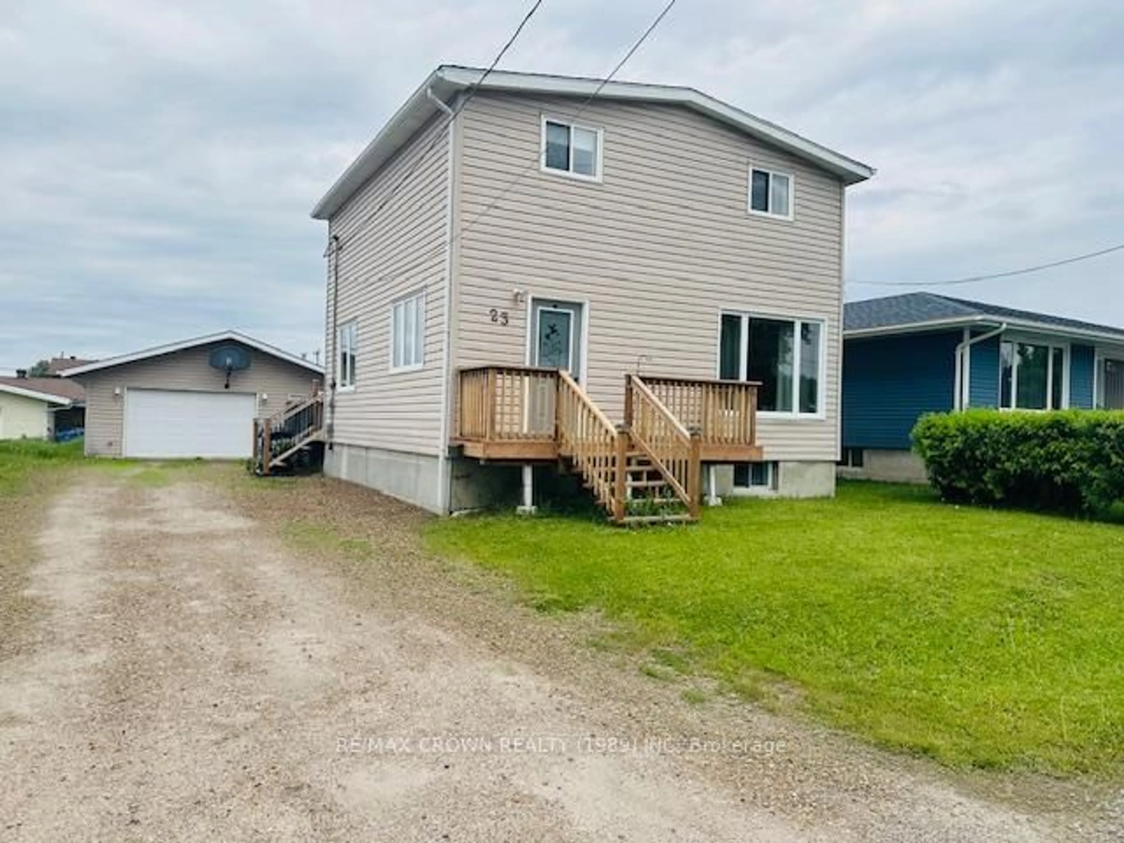 A pic from outside/outdoor area/front of a property/back of a property/a pic from drone, unknown for 23 Cartier Ave, Kapuskasing Ontario P5N 2J7