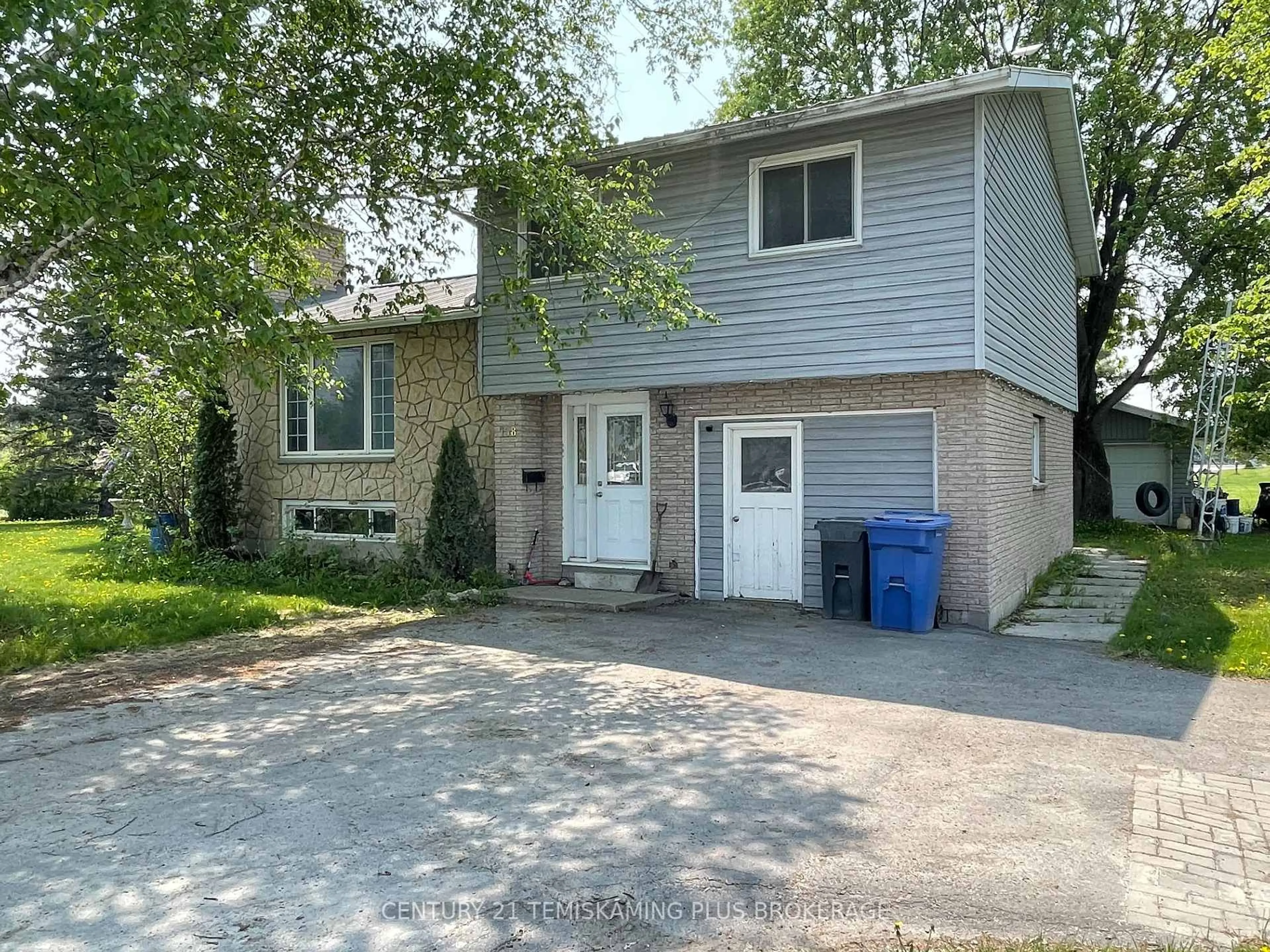 Home with vinyl exterior material, street for 138 Fourth Ave, Englehart Ontario P0J 1H0