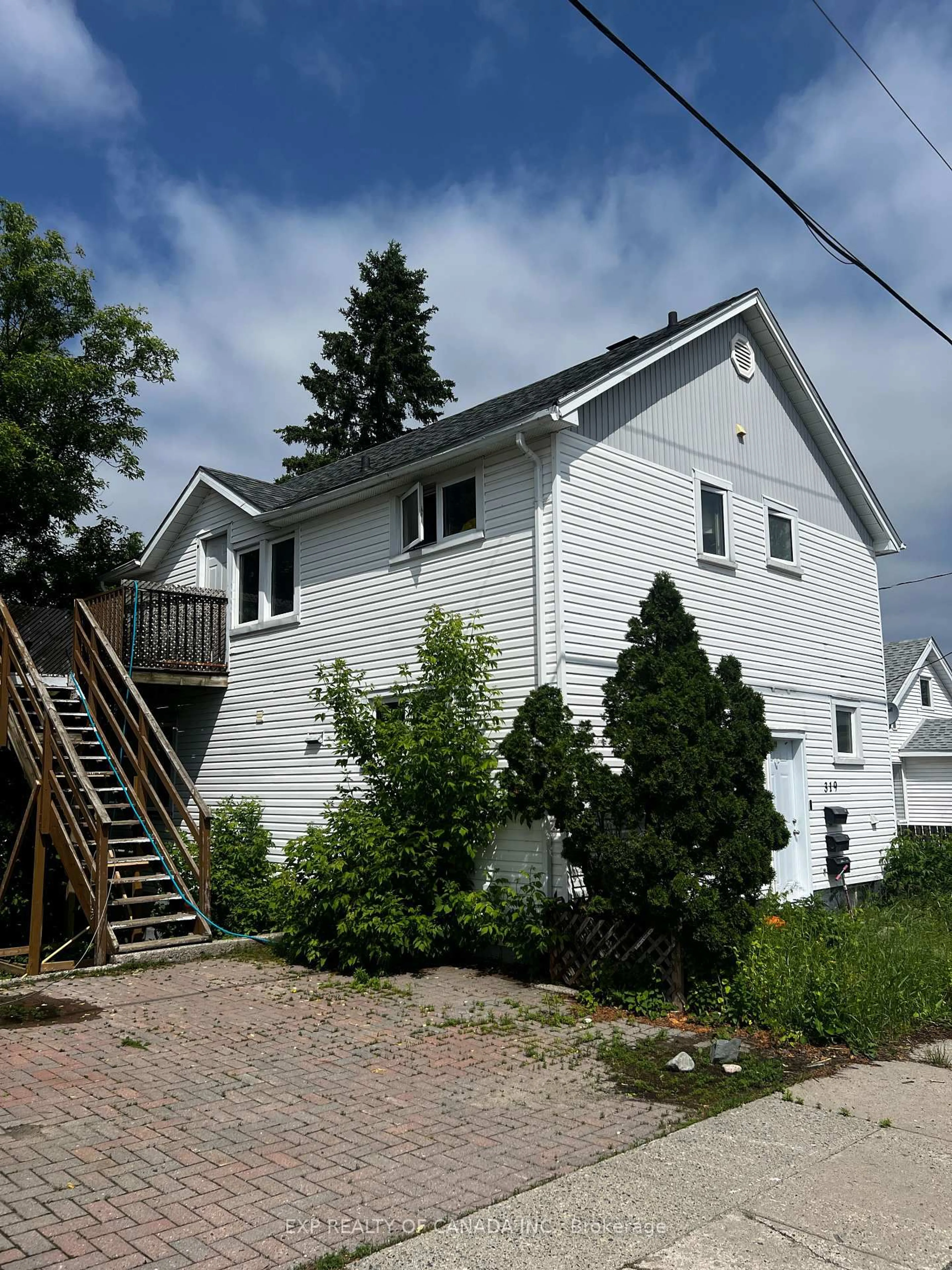 Home with vinyl exterior material, building for 319 Hart St, Timmins Ontario P4N 6W9